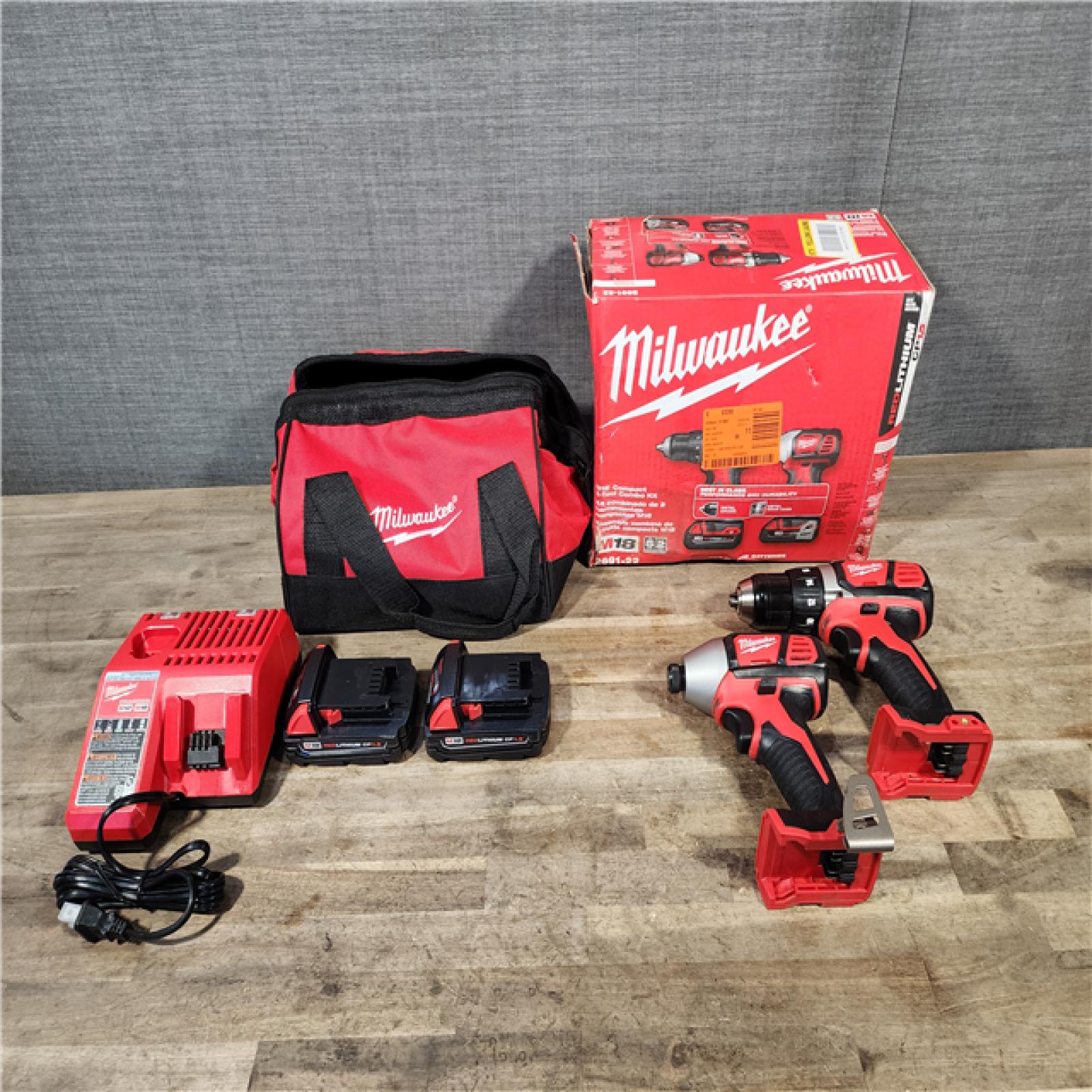 HOUSTON LOCATION - AS-IS Milwaukee 18V Cordless Brushed 2-Tool Drill/Driver and Impact Driver Kit