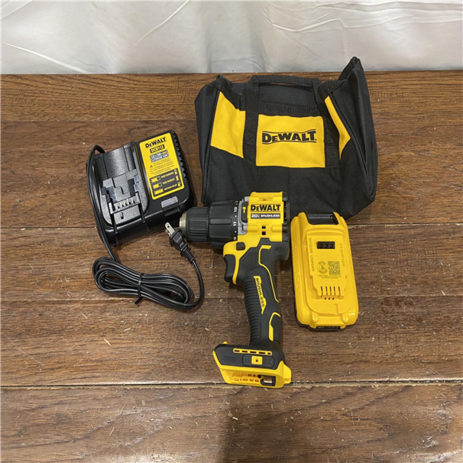 AS-IS DEWALT ATOMIC 20-Volt Lithium-Ion Cordless 1/2 in. Compact Hammer Drill with 3.0Ah Battery, Charger and Bag