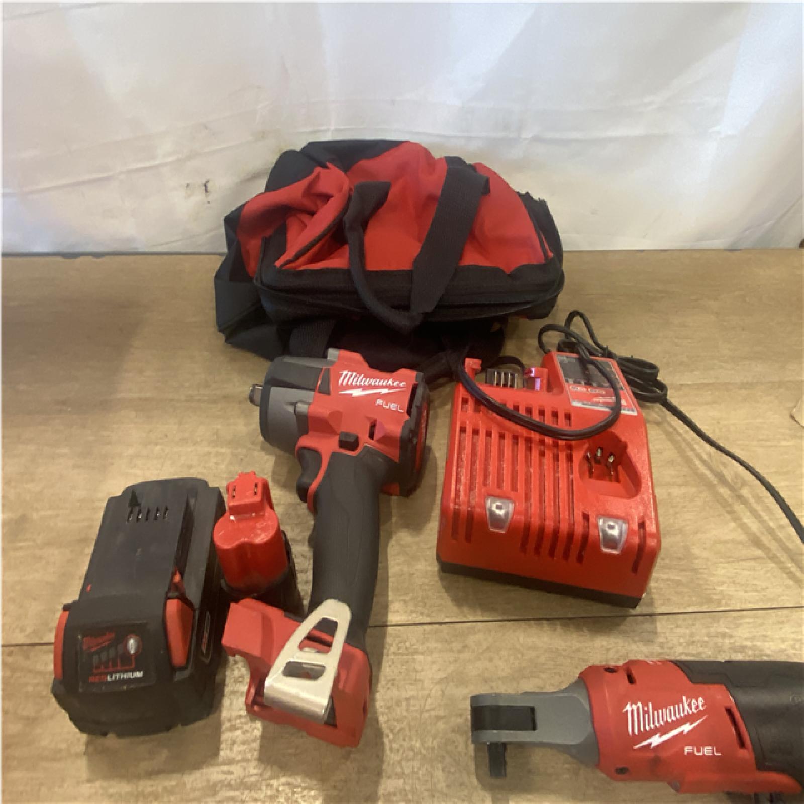 AS-IS Milwaukee FUEL 18V Cordless Mid Torque 1/2 in. Impact Wrench w/ 12 FUEL 3/8 in. Ratchet Combo Kit