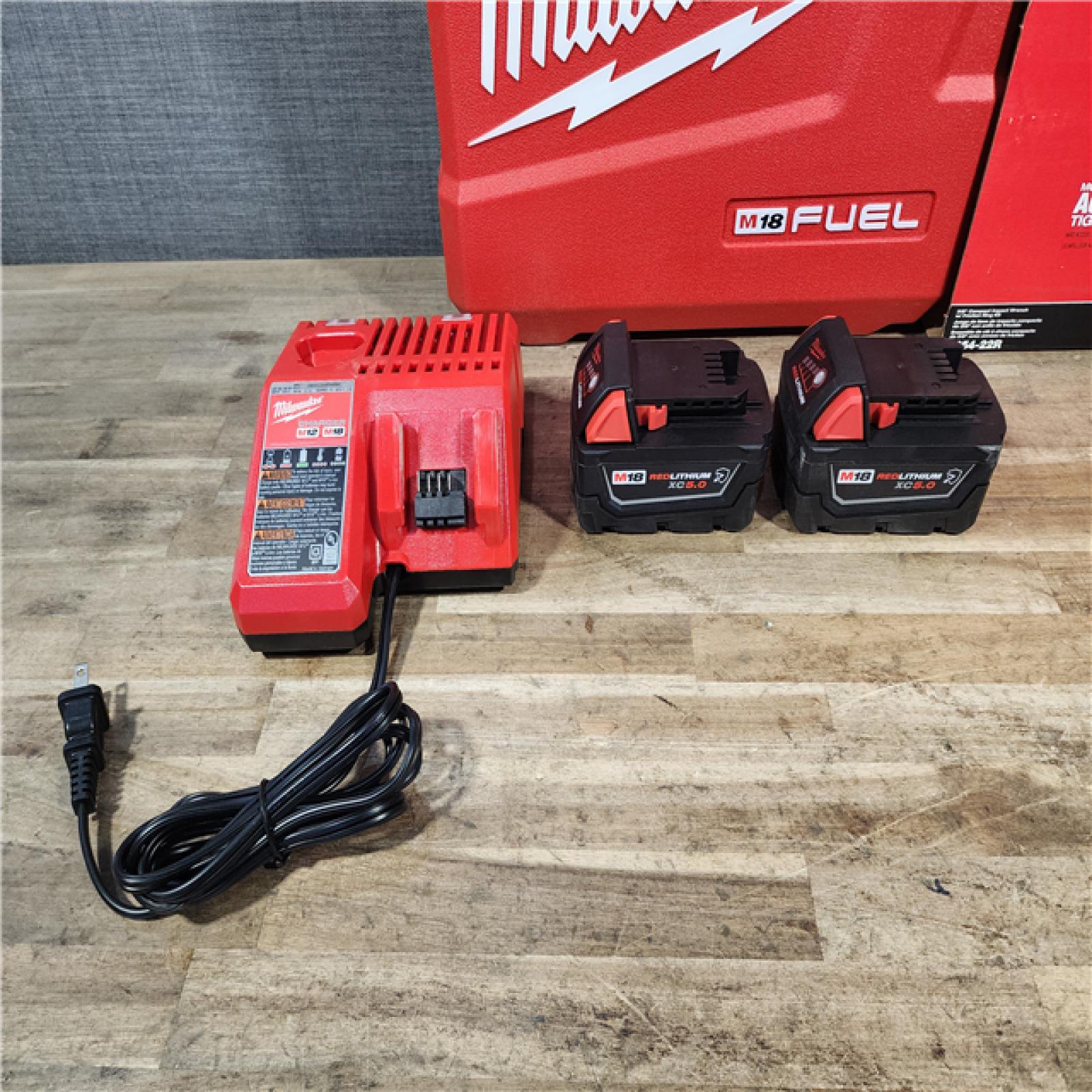 HOUSTON LOCATION - AS-IS (APPEARS LIKE NEW) Milwaukee FUEL 18V Lithium-Ion Brushless Cordless 3/8 in. Compact Impact Wrench Kit