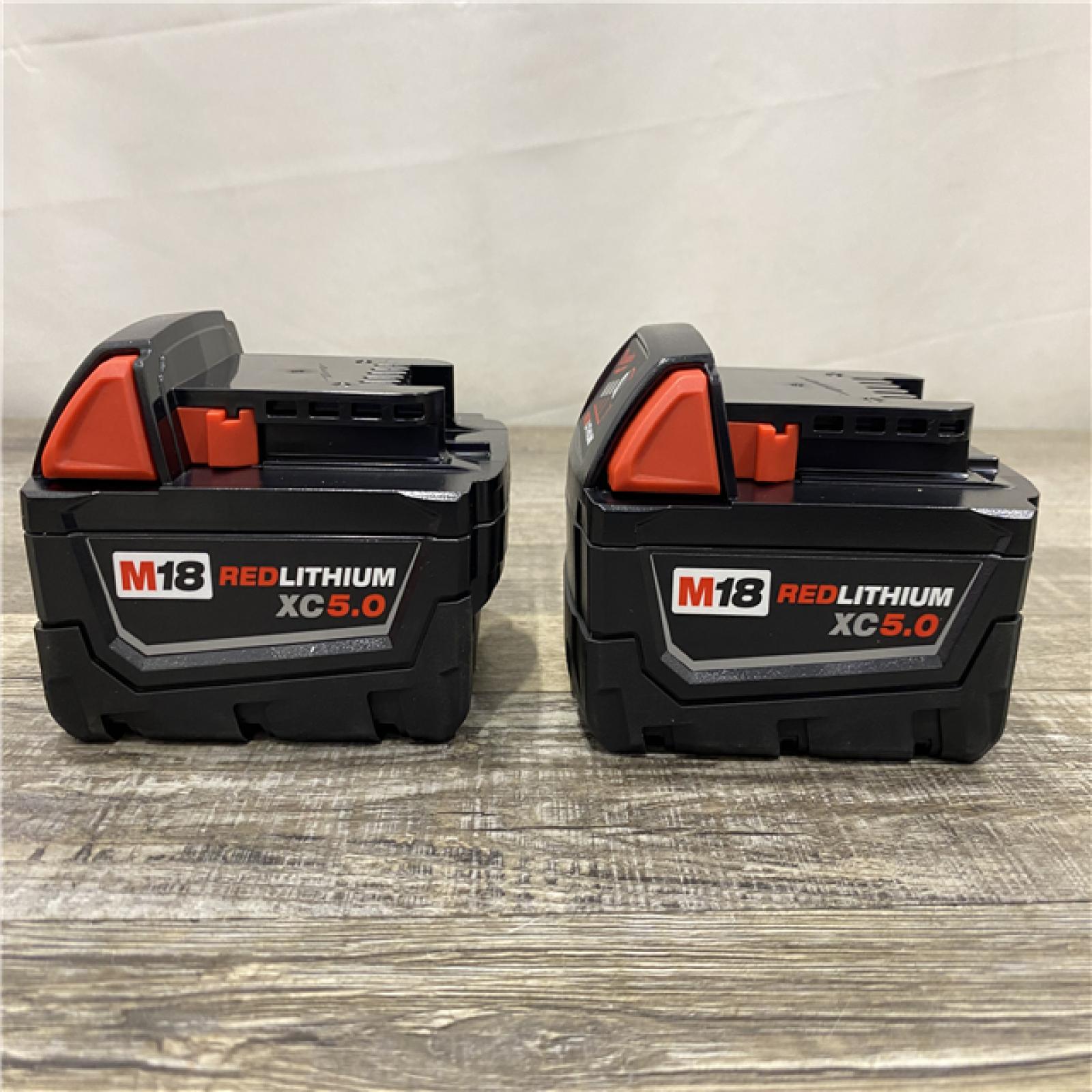 AS-IS Milwaukee 18-Volt Lithium-Ion XC Starter Kit with Two 5.0Ah Batteries and Charger