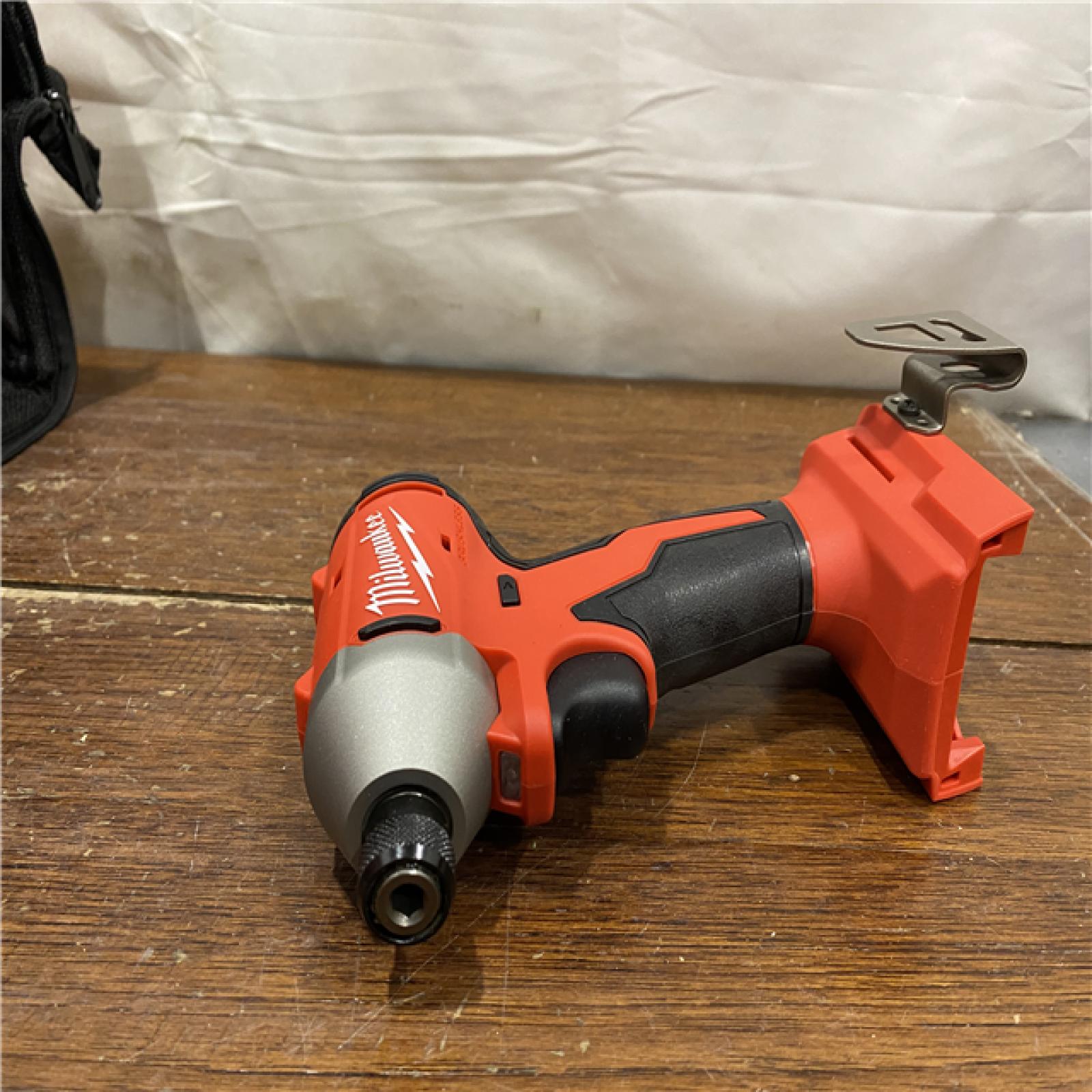 AS-IS Milwaukee M18 Compact Brushless 1/4  Hex Impact Driver Kit