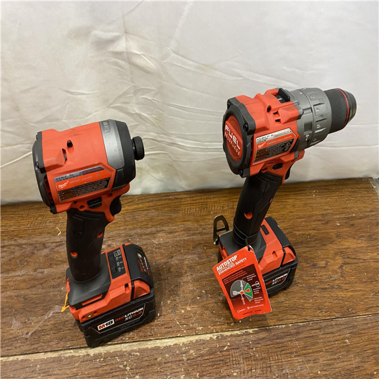 AS-IS MILWAUKEE M18 FUEL 18V Lithium-Ion Brushless Cordless Hammer Drill and Impact Driver Combo Kit (2-Tool) with 2 Batteries