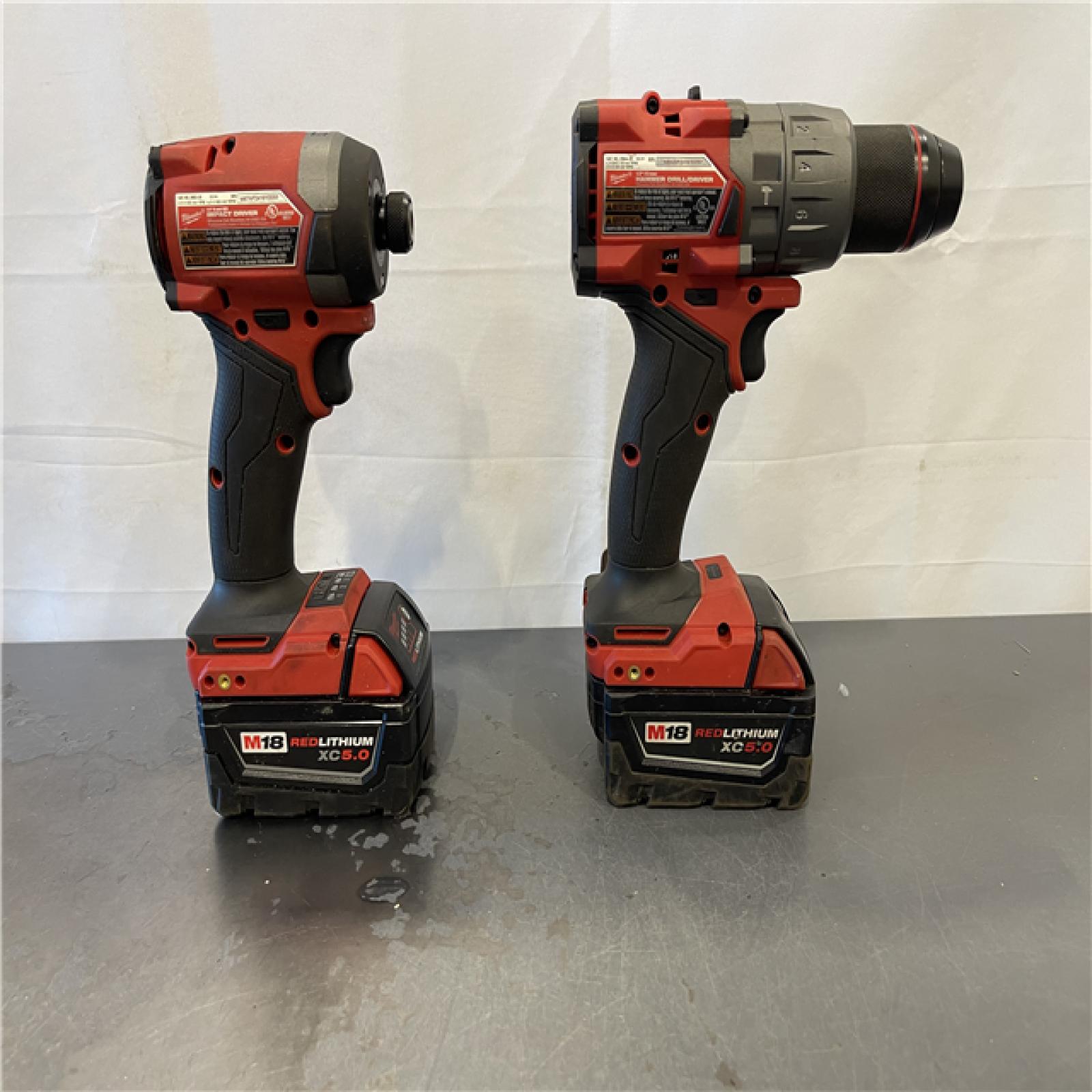 AS-IS - Milwaukee M18 FUEL 18V Lithium-Ion Brushless Cordless Hammer Drill and Impact Driver Combo Kit (2-Tool) with 2 Batteries