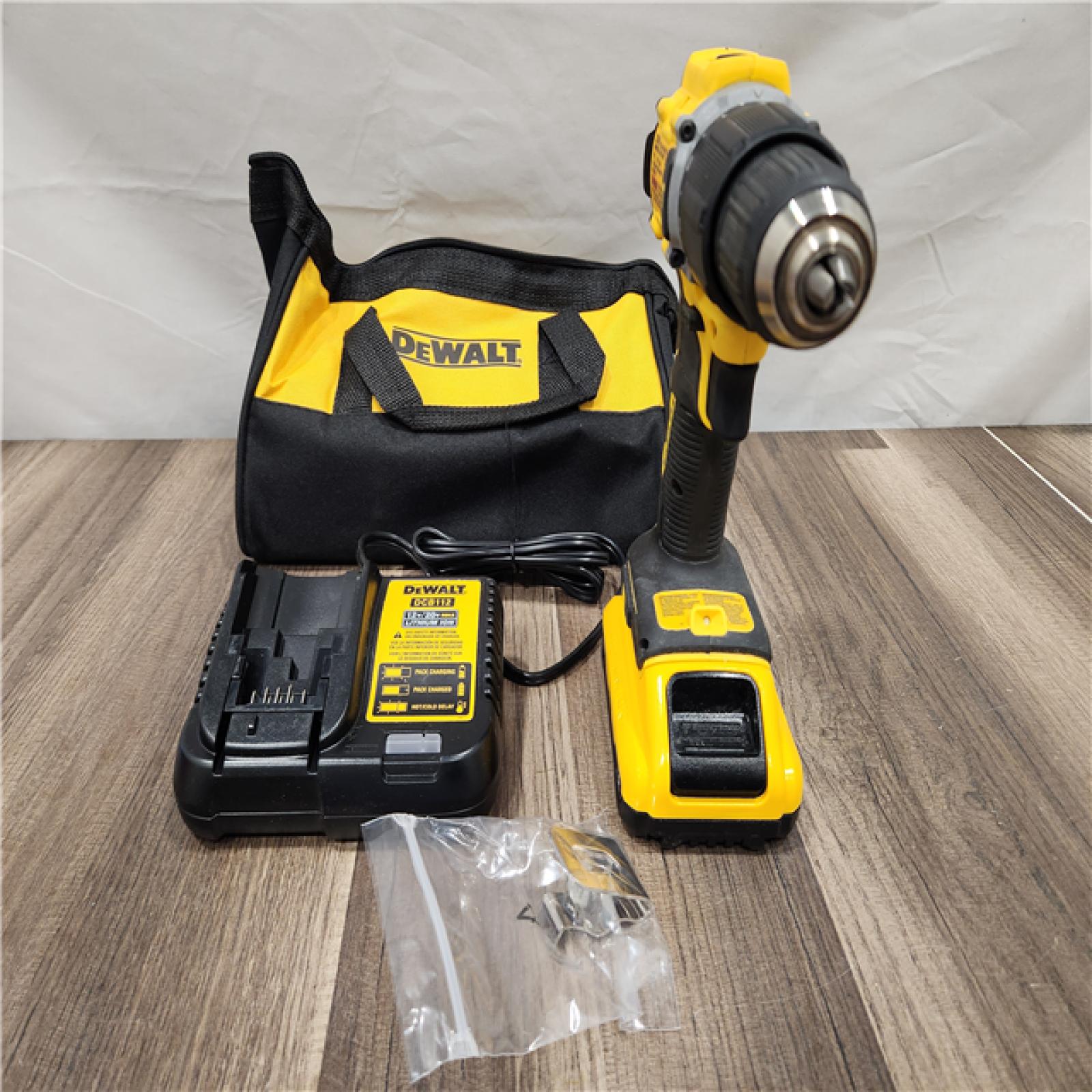 AS-IS DEWALT ATOMIC 20-Volt Lithium-Ion Cordless 1/2 in. Compact Hammer Drill with 3.0Ah Battery, Charger and Bag