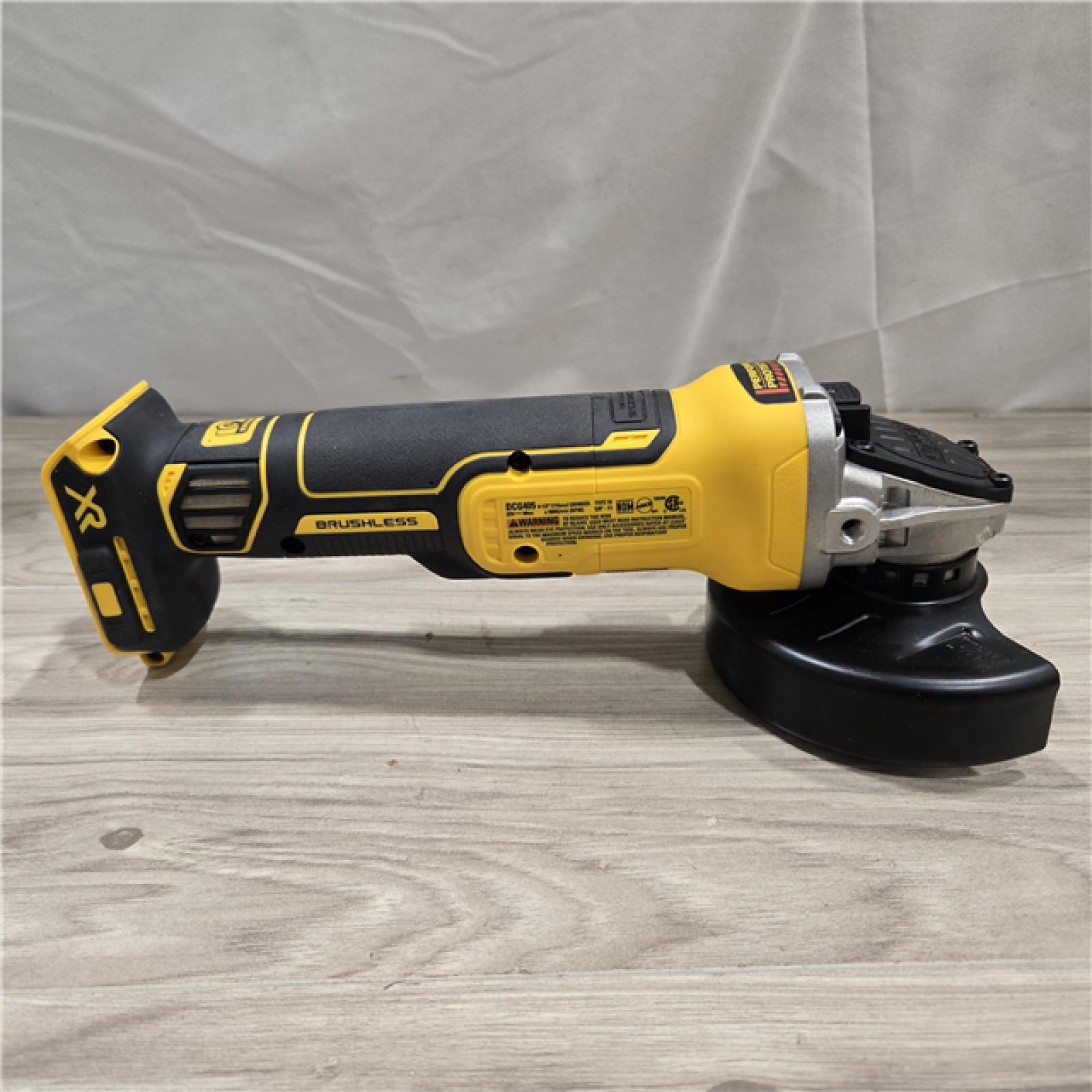 AS-IS DeWalt DCG405B 20V Max XR 4.5-Inch Slide Switch Small Angle Grinder (Tool Only)