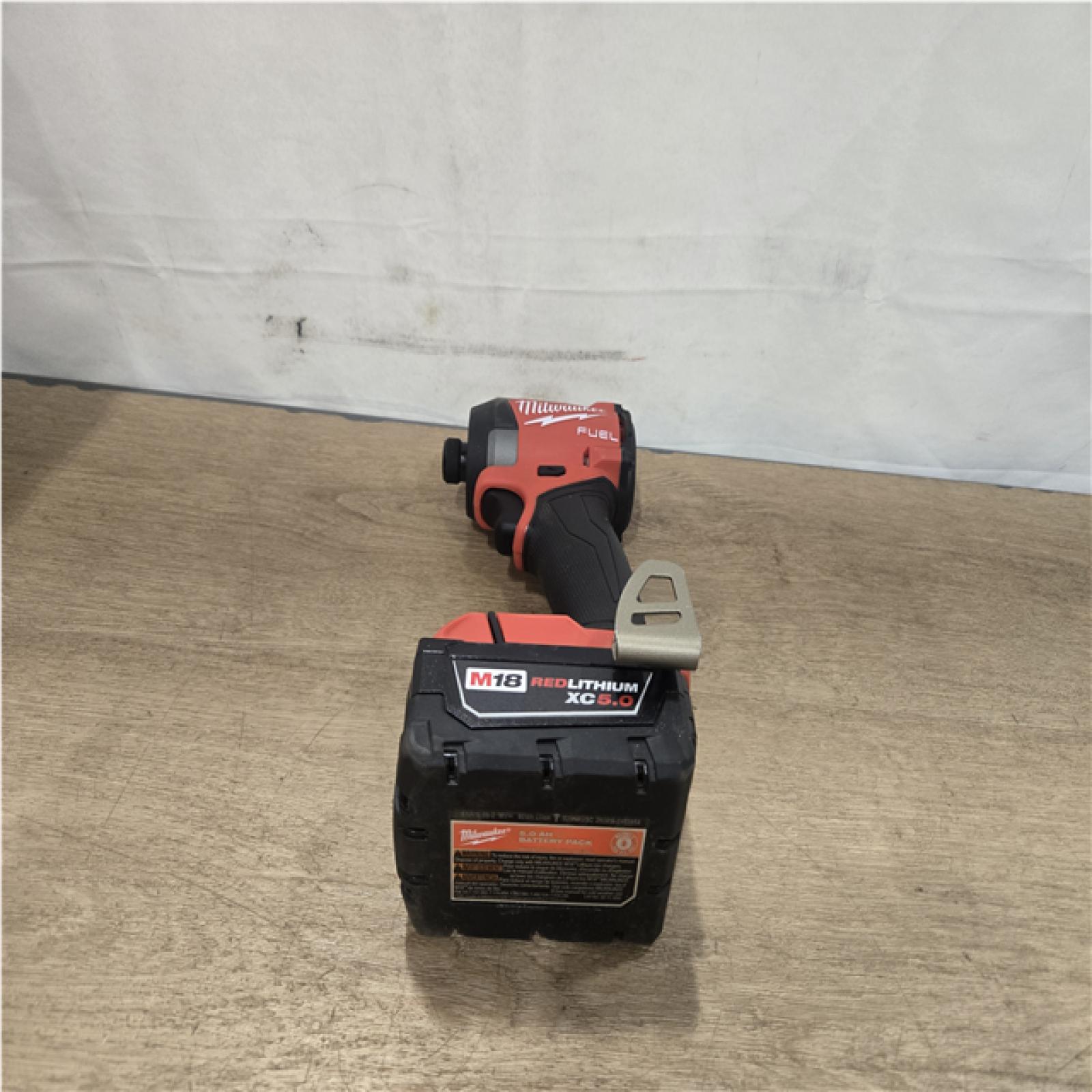 AS-IS Milwaukee FUEL 18V Lithium-Ion Brushless Cordless Hammer Drill and Impact Driver Combo Kit