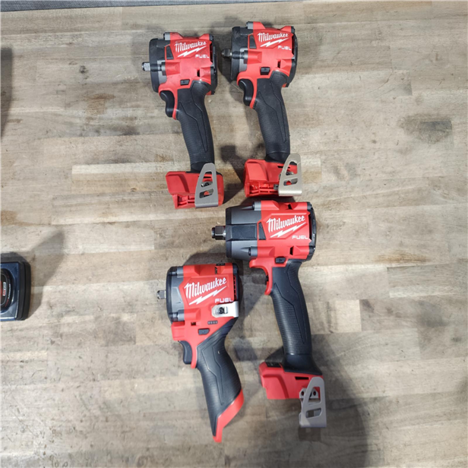 HOUSTON LOCATION - AS-IS MILWAUKEE 4 TOOL COMBO KIT W/ (2) BATTERY & CHARGER