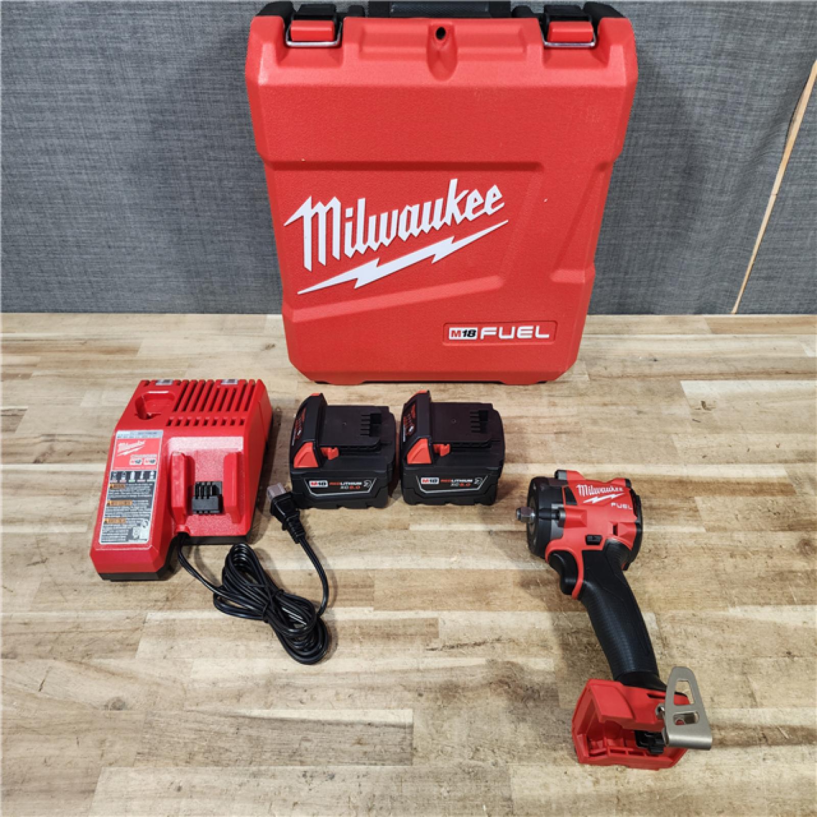 HOUSTON LOCATION - AS - IS Milwaukee FUEL 18V Lithium-Ion Brushless Cordless 3/8 in. Compact Impact Wrench Kit