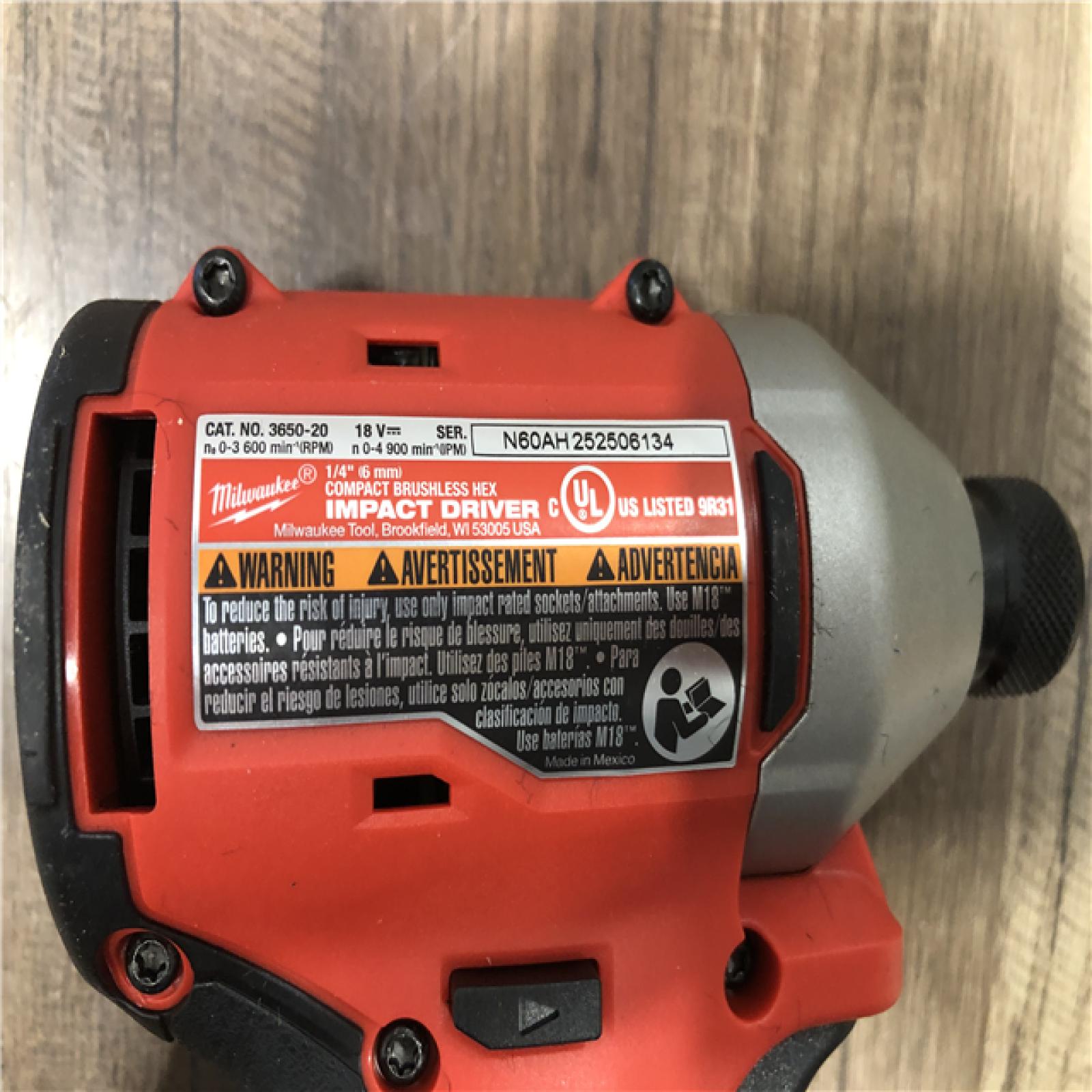 AS-IS Milwaukee M18 18V Lithium-Ion Brushless Cordless 1/4 in. Compact Impact Driver (Tool Only)