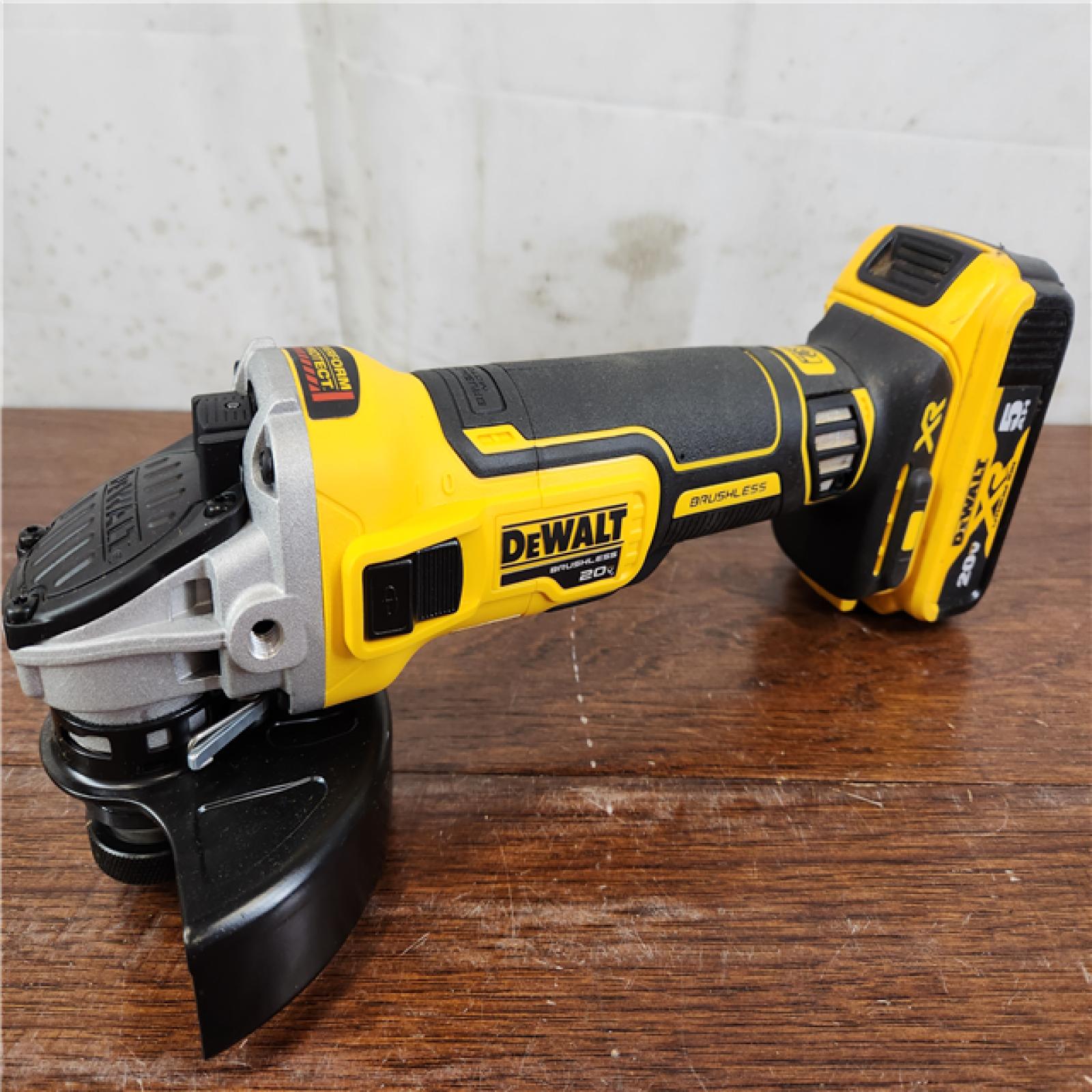 AS-IS DEWALT 20V MAX XR Brushless Cordless 4-1/2 in. Small Angle Grinder w/ (1) Battery And Charger