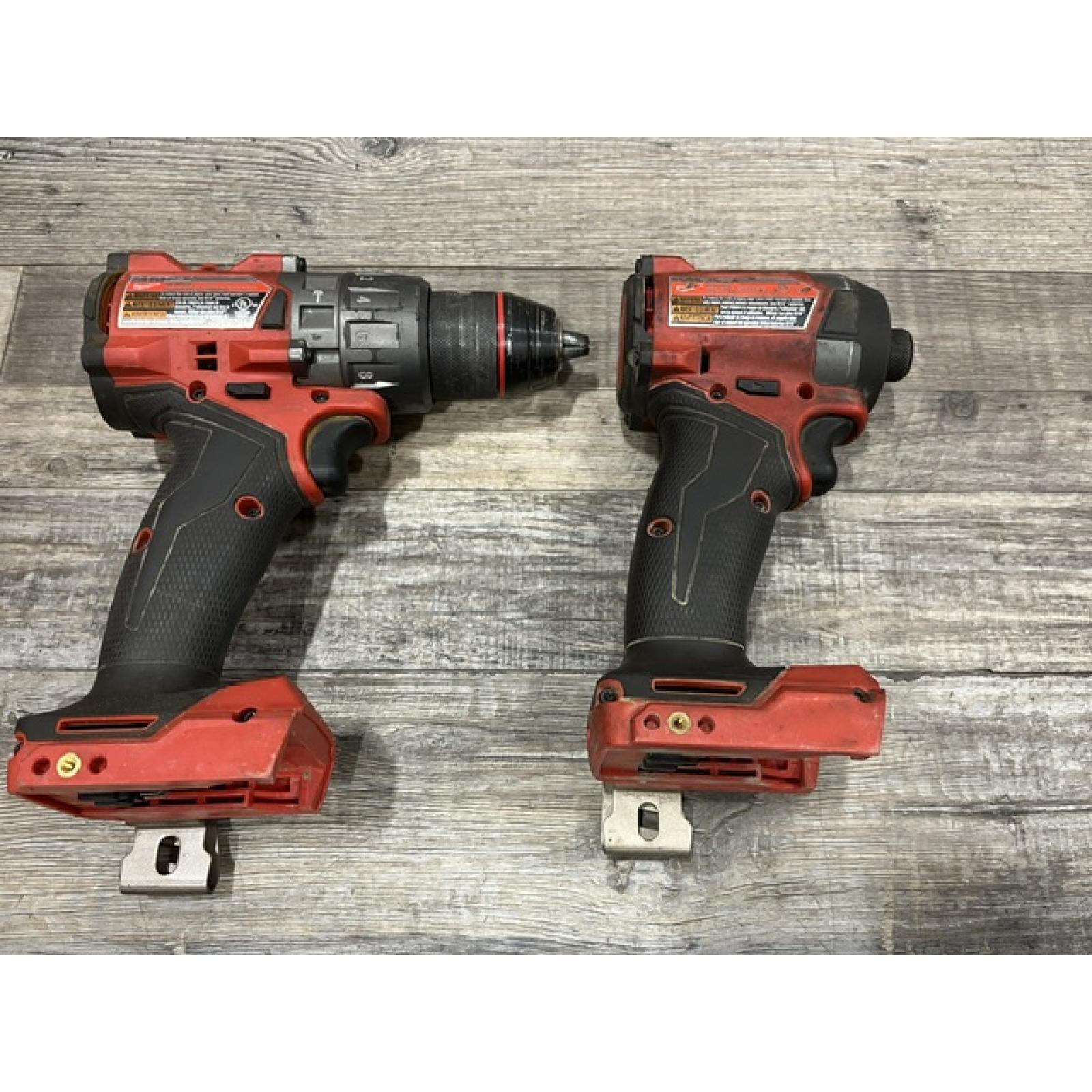 AS-IS Milwaukee FUEL 18V Lithium-Ion Brushless Cordless Hammer Drill and Impact Driver Combo Kit