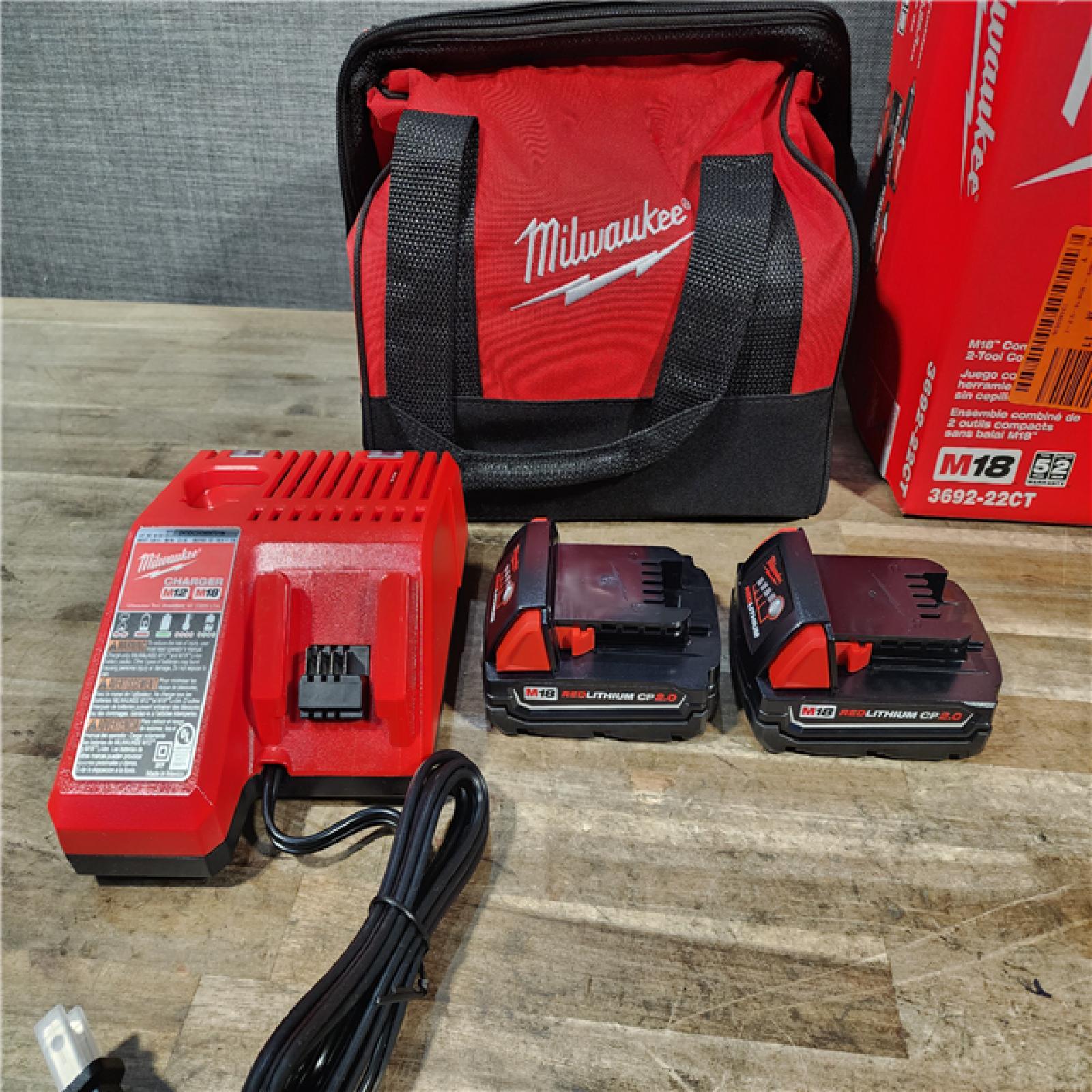 HOUSTON LOCATION - AS-IS Milwaukee M18 18V Lithium-Ion Brushless Cordless Compact Drill/Impact Combo Kit (2-Tool) W/(2) 2.0 Ah Batteries  Charger & Bag