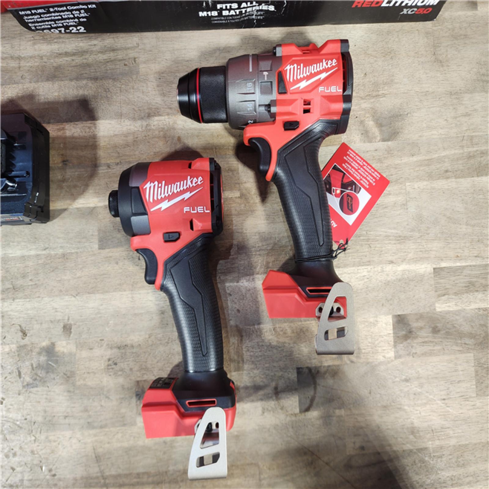 HOUSTON LOCATION - AS-IS (APPEARS LIKE NEW) MILWAUKEE FUEL 18V Lithium-Ion Brushless Cordless Hammer Drill and Impact Driver Combo Kit (2-Tool) with 2 Batteries