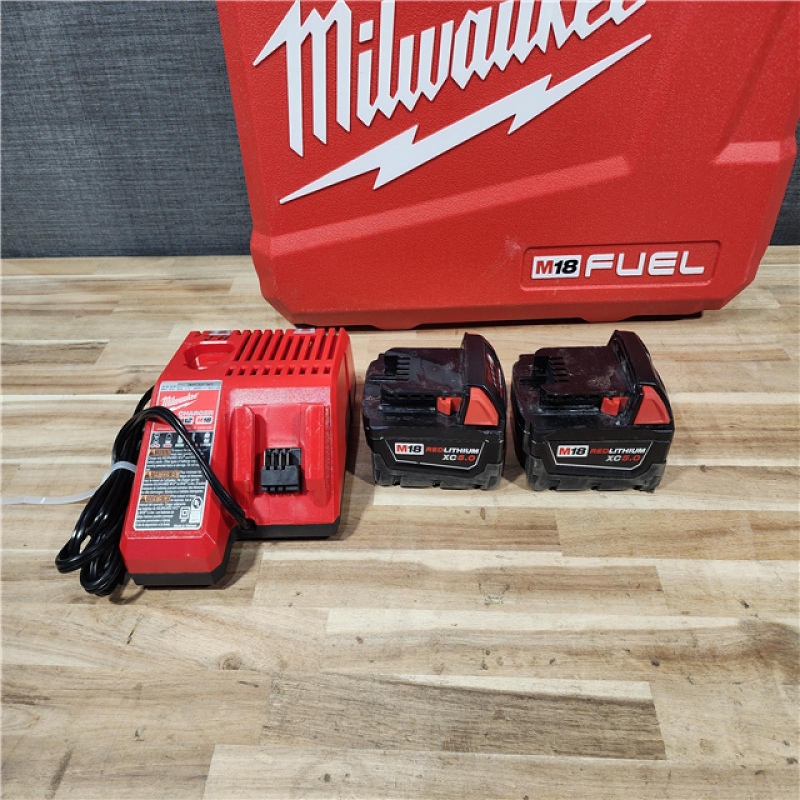 HOUSTON LOCATION - AS-IS Milwaukee  FUEL 18V Lithium-Ion Brushless Cordless Hammer Drill and Impact Driver Combo Kit