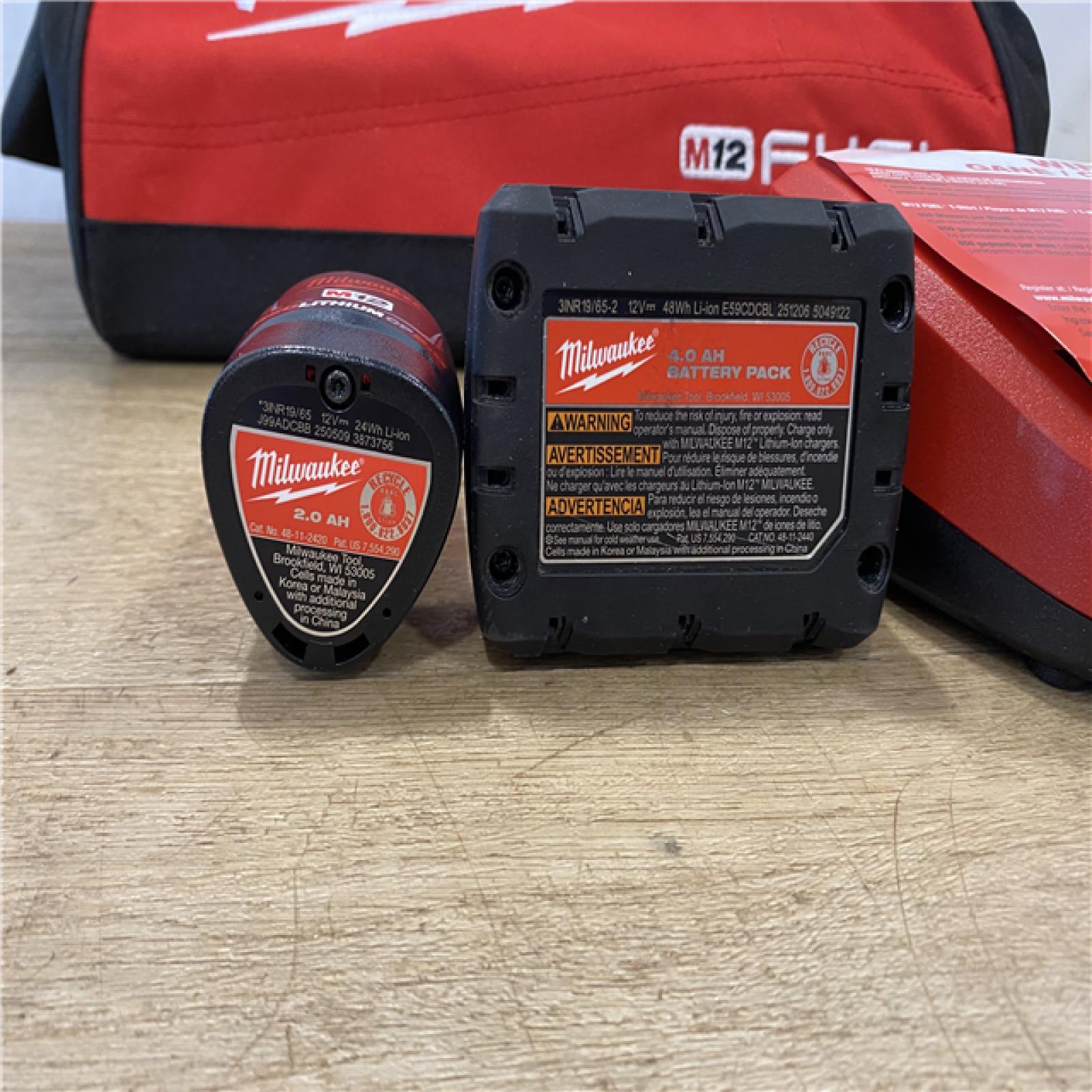 AS-IS Milwaukee FUEL 12-Volt Lithium-Ion Brushless Cordless Hammer Drill and Impact Driver Combo Kit