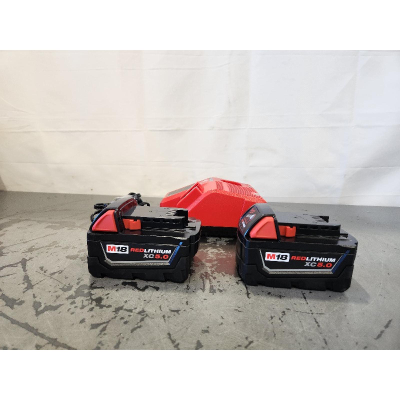AS-IS- Milwaukee M18 18-Volt Lithium-Ion XC Starter Kit with Two 5.0Ah Batteries and Charger