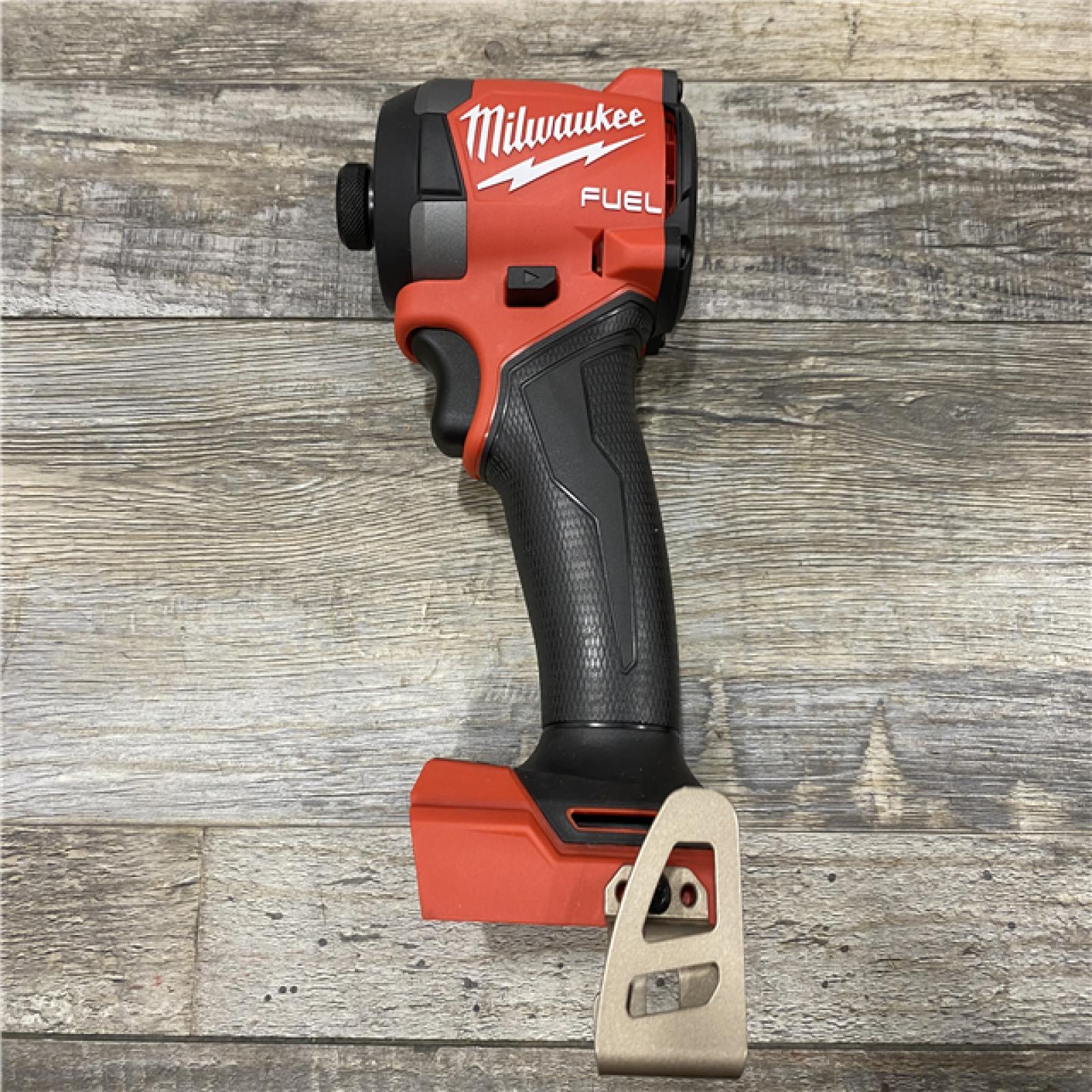 AS-IS Milwaukee FUEL 18V Lithium-Ion Brushless Cordless 1/4 in. Hex Impact Driver Kit