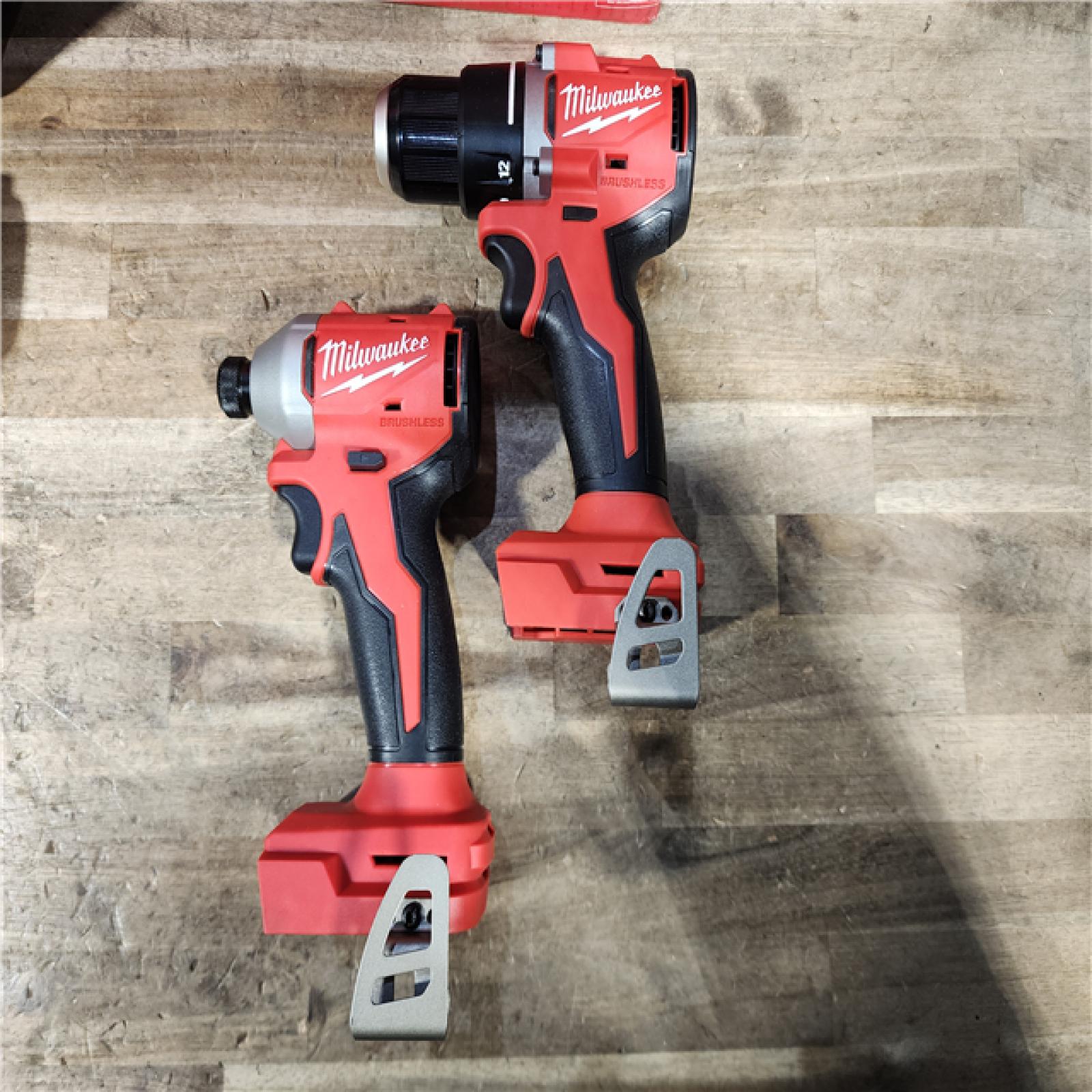 HOUSTON LOCATION - AS-IS Milwaukee M18 18V Lithium-Ion Brushless Cordless Compact Drill/Impact Combo Kit (2-Tool) W/(2) 2.0 Ah Batteries  Charger & Bag