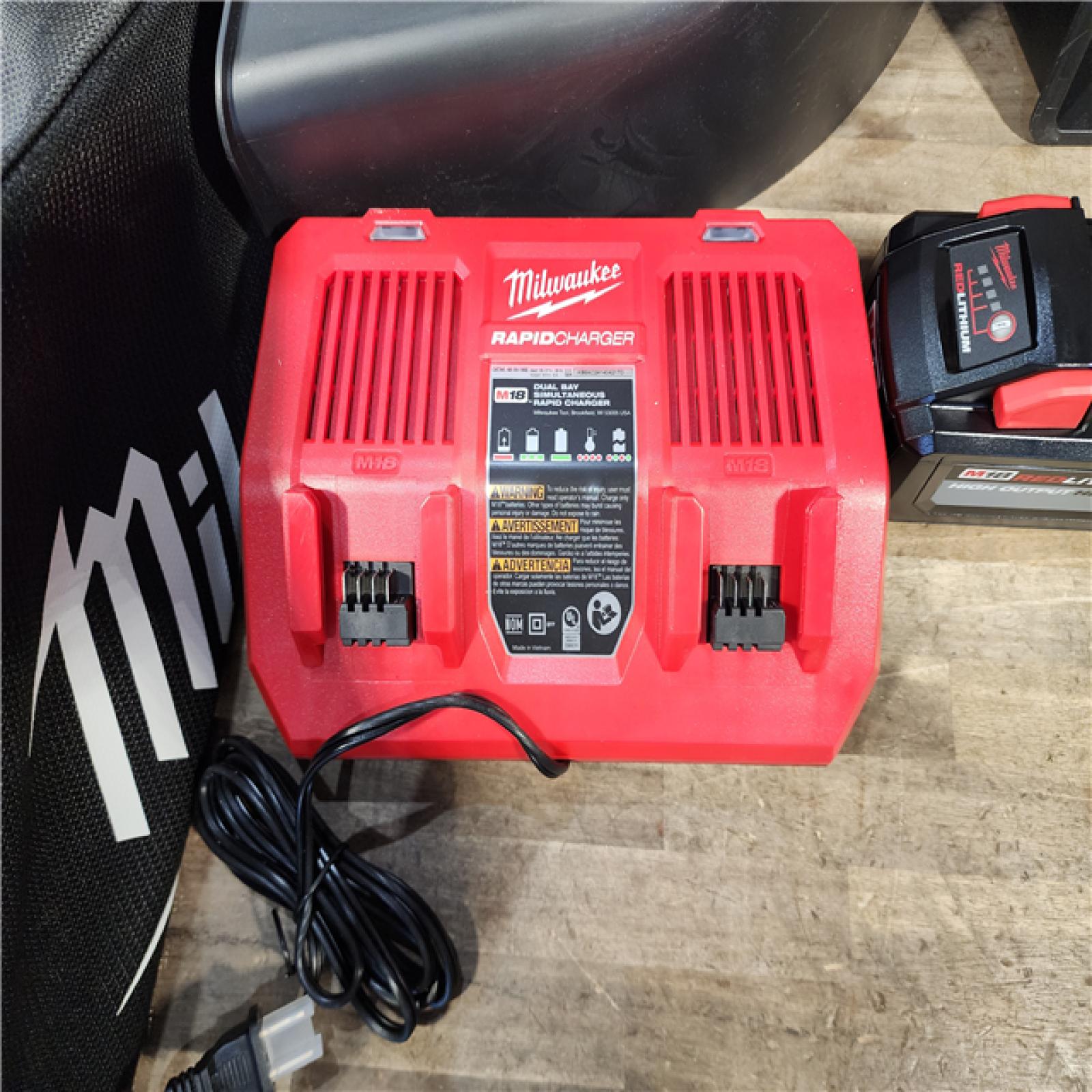 HOUSTON LOCATION - AS-IS Milwaukee M18 FUEL Brushless Cordless 21 in. Walk Behind Dual Battery Self-Propelled Mower Kit W/ (2) HD12.0 BATTERY & RAPID CHARGER