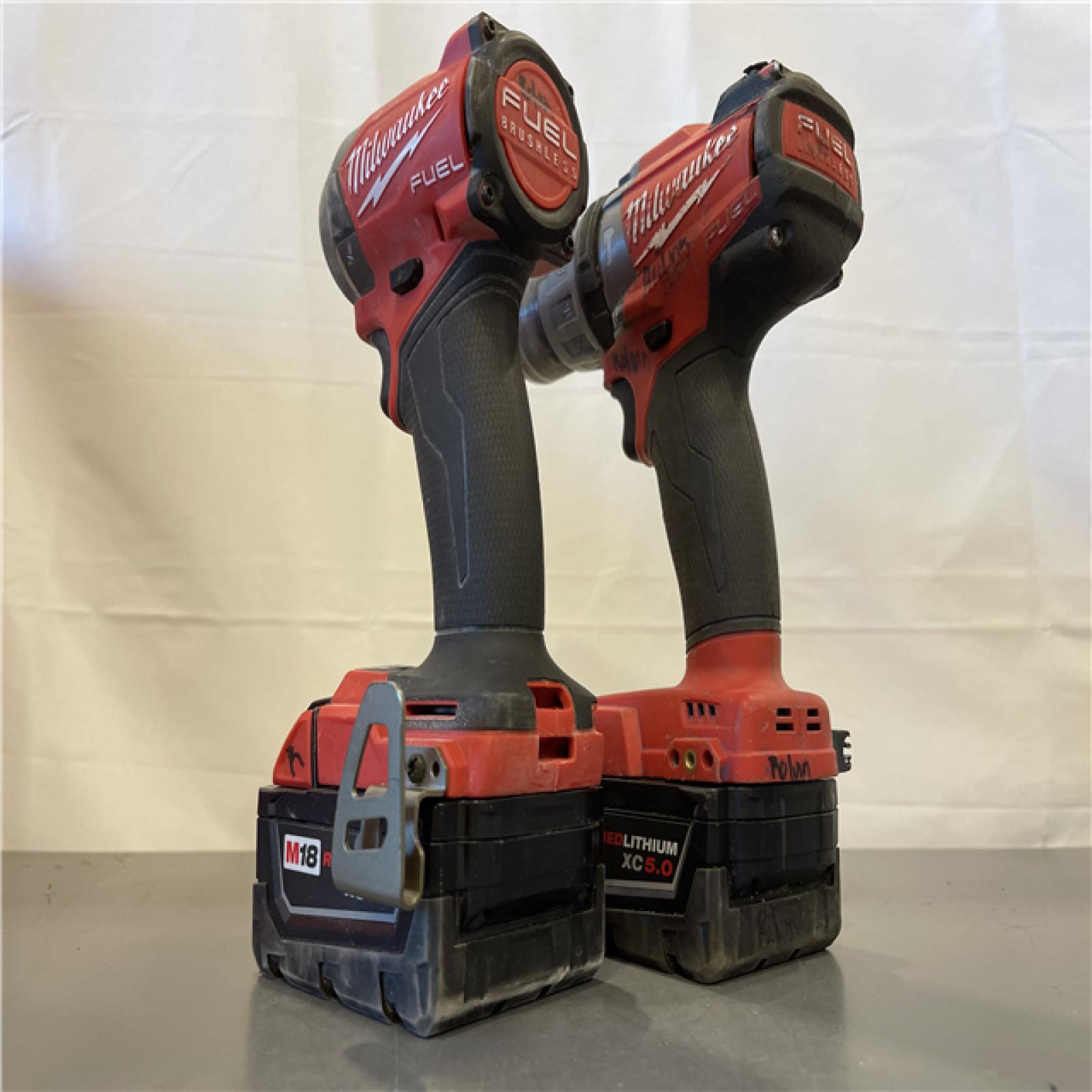 AS-IS - MILWAUKEE FUEL 18V Lithium-Ion Brushless Cordless Hammer Drill and Impact Driver Combo Kit