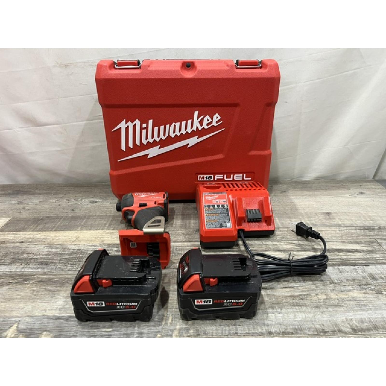 AS-IS Milwaukee FUEL SURGE 18V Lithium-Ion Brushless Cordless 1/4 in. Hex Impact Driver Kit