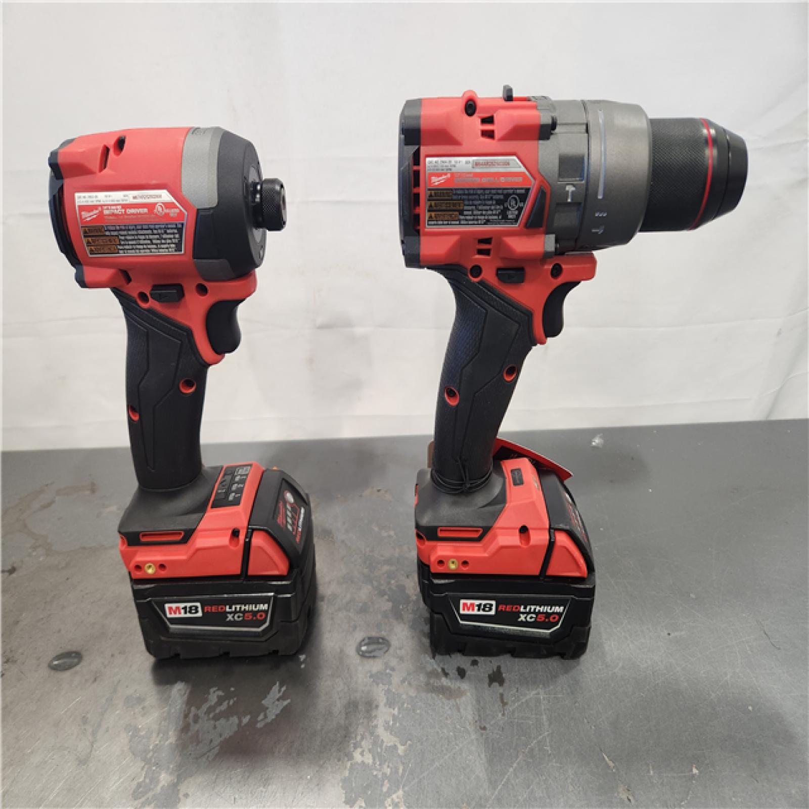 AS-IS- MILWAUKEE FUEL 18V Lithium-Ion Brushless Cordless Hammer Drill and Impact Driver Combo Kit