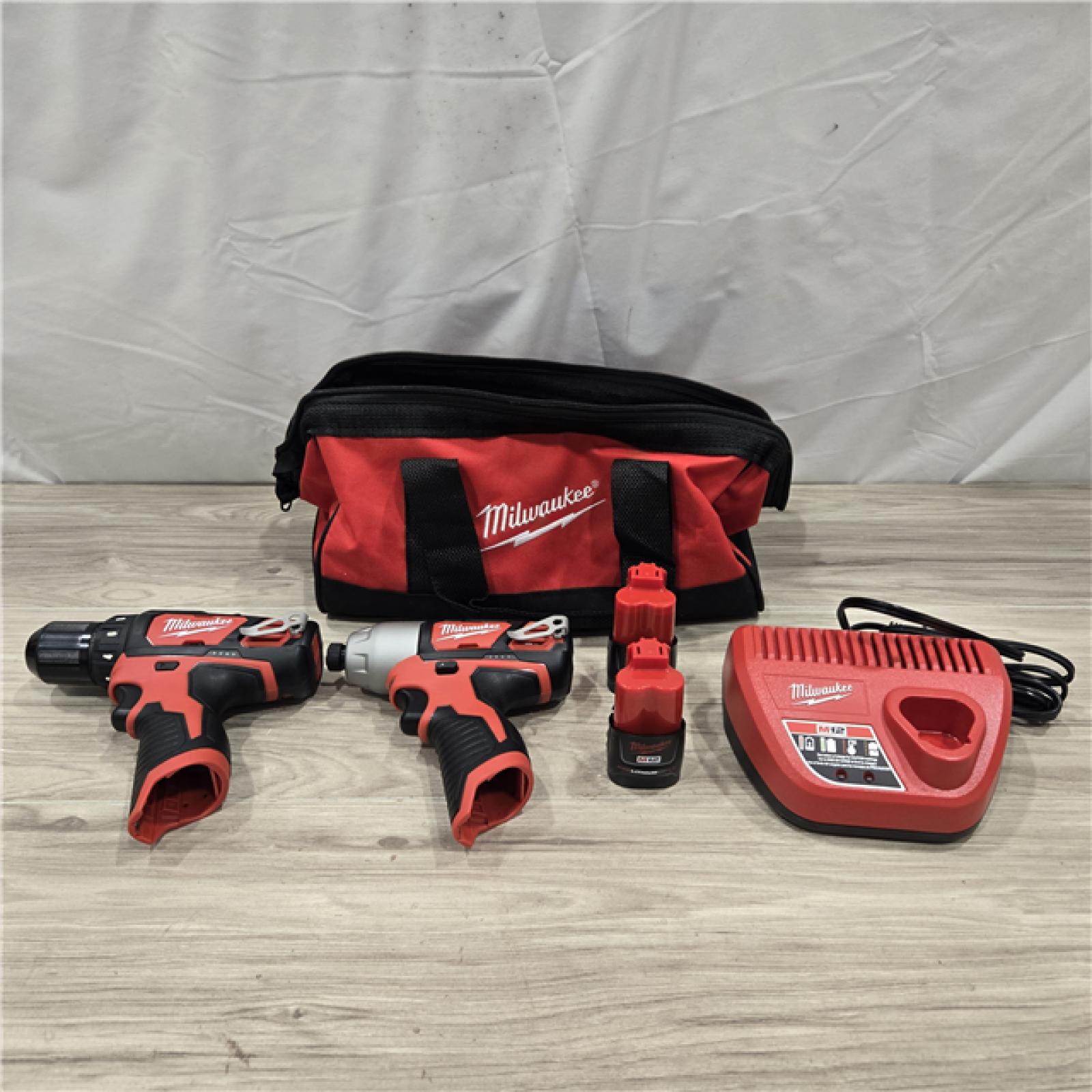 AS-IS Milwaukee 2494-22 M12 Cordless 3/8 Drill / Driver and 1/4 Hex Impact Driver Kit