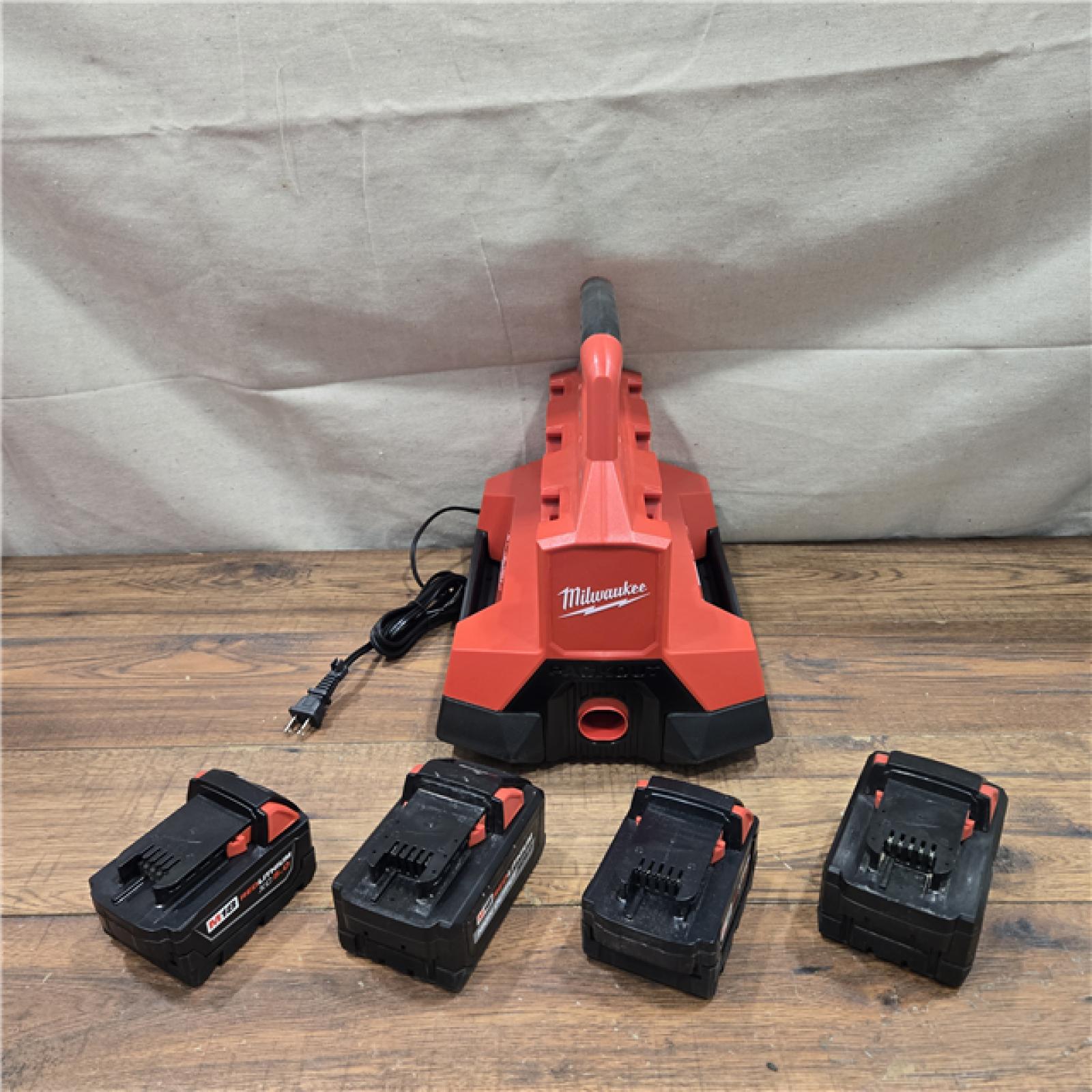AS-IS Milwaukee18-Volt Lithium-Ion Battery Pack (2) 5.0Ah and High Output Battery Pack (2) 6.0Ah with PACKOUT 6-Port Rapid Charger