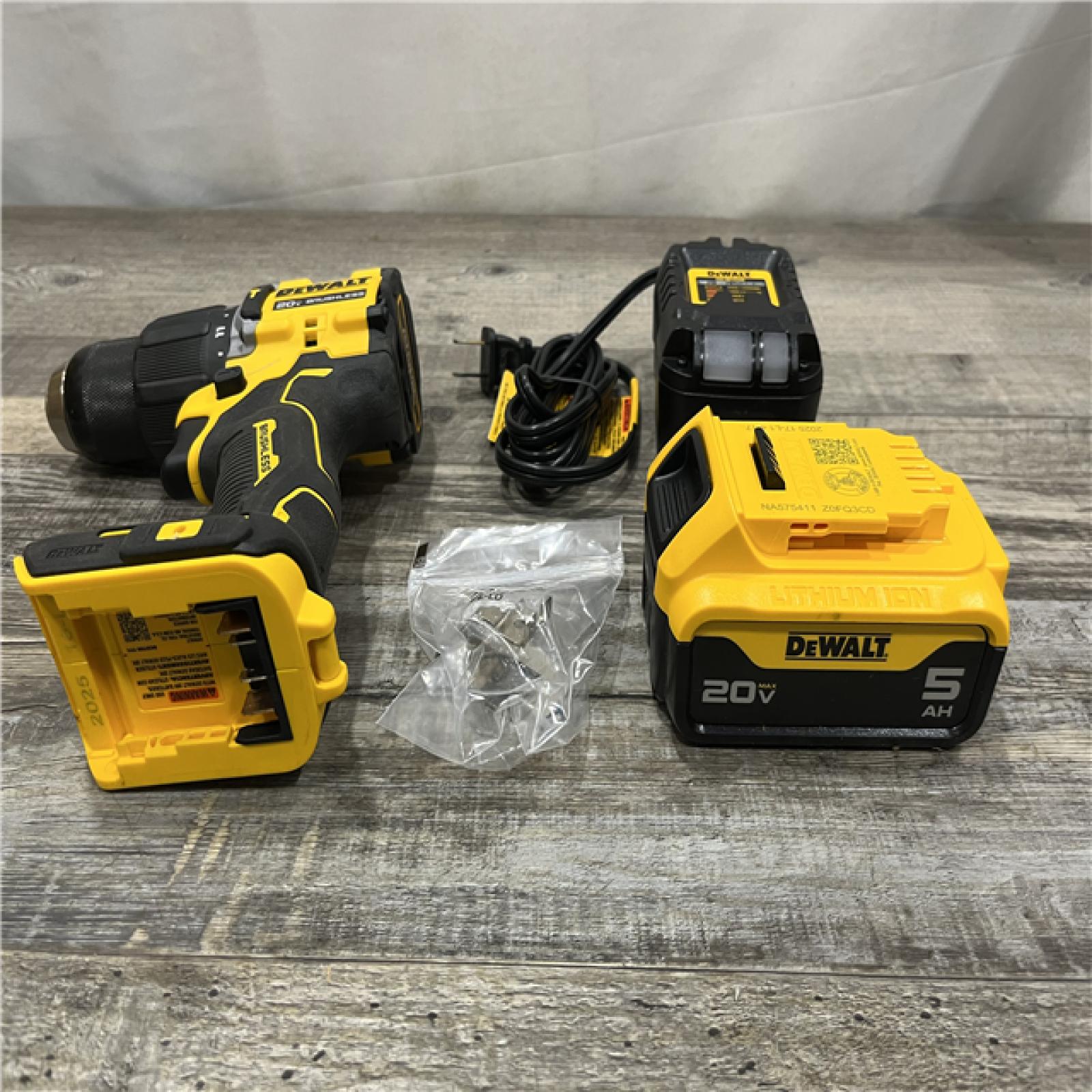 AS-IS DEWALT ATOMIC 20V Lithium-Ion Cordless 1/2 in. Hammer Drill Kit