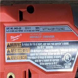 Houston Location AS-IS Milwaukee FUEL Impact Driver and Battery with Charger