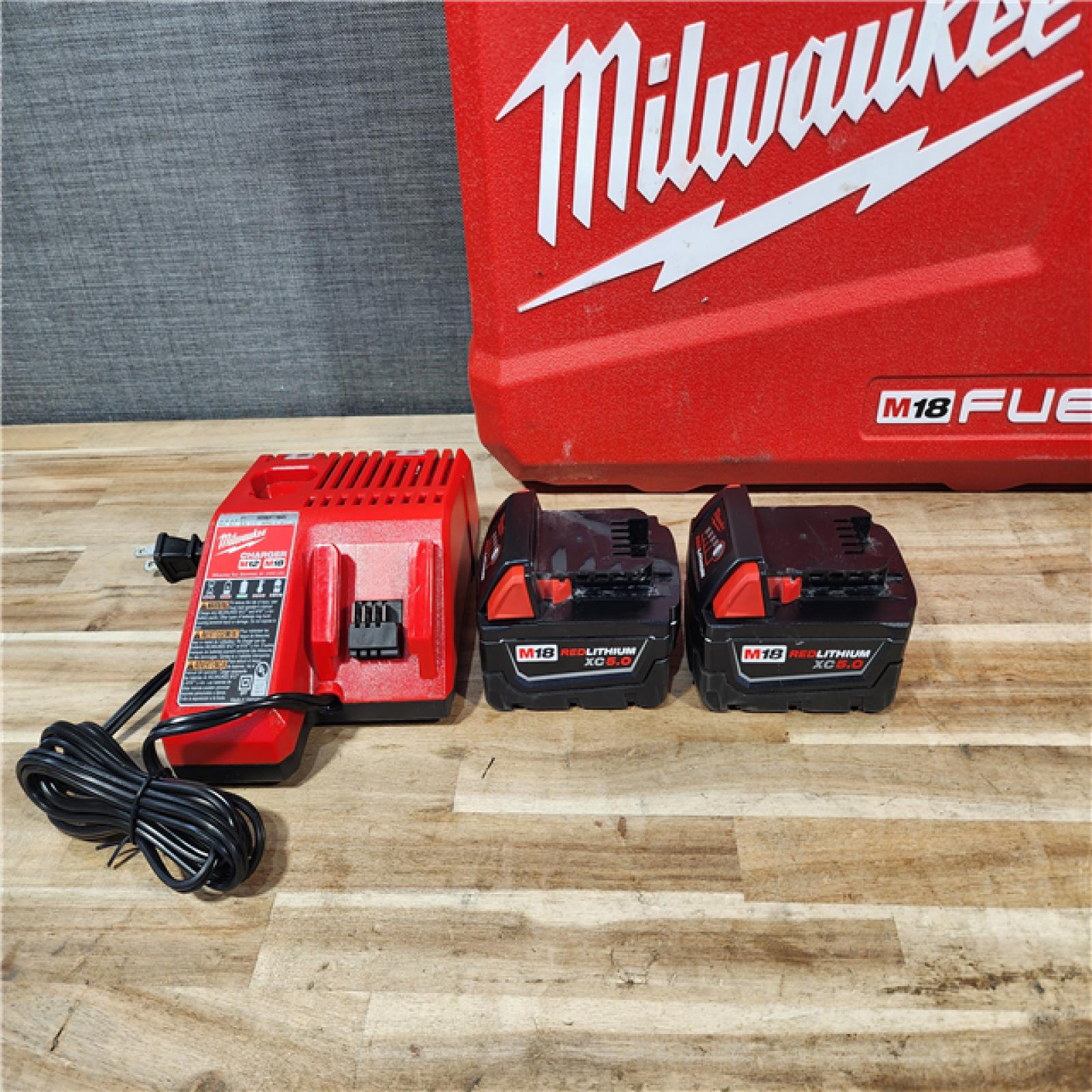 HOUSTON LOCATION - AS-IS Milwaukee FUEL 18V Lithium-Ion Brushless Cordless Hammer Drill and Impact Driver Combo Kit
