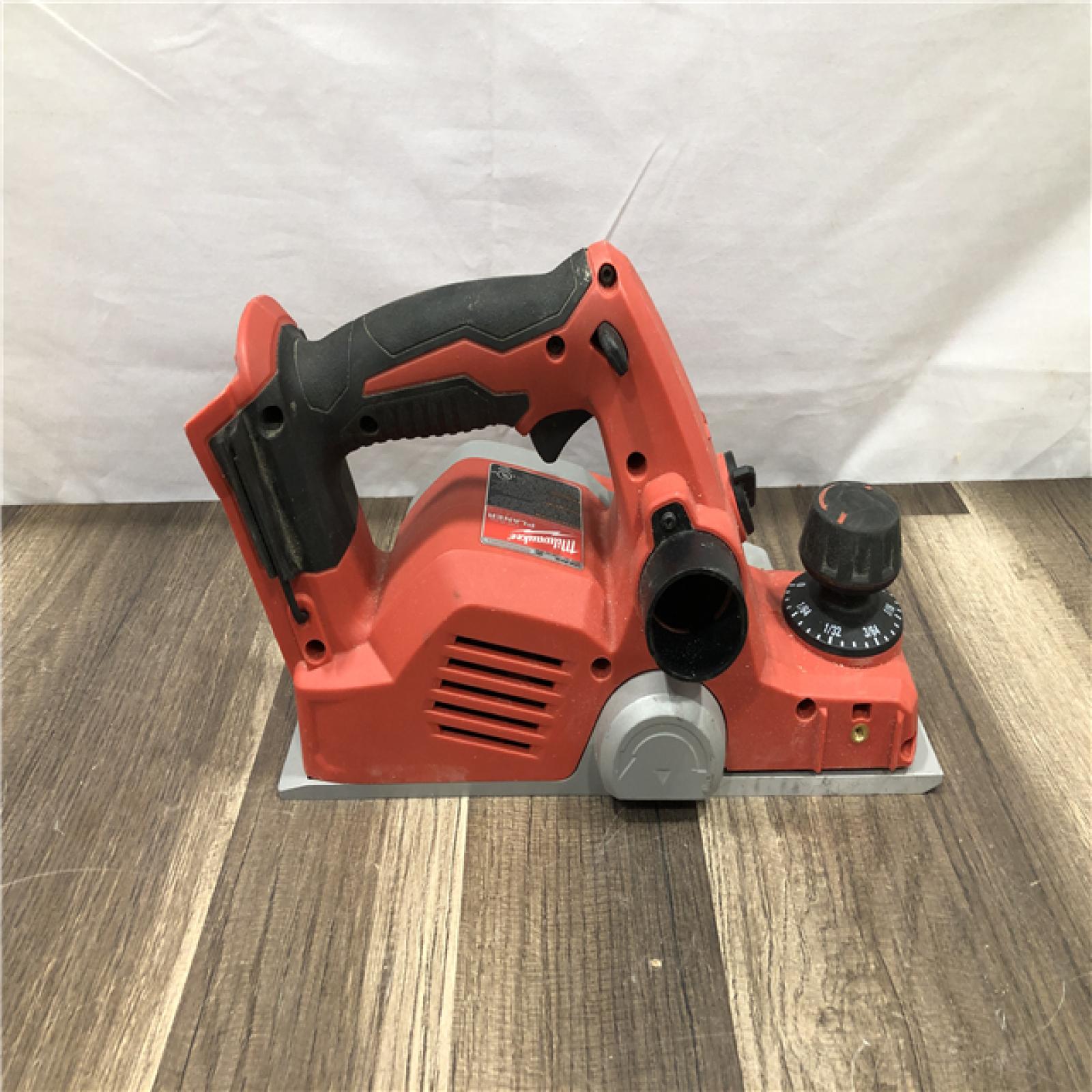 AS-IS Milwaukee M18 18V Lithium-Ion Cordless 3-1/4 in. Planer (Tool-Only)