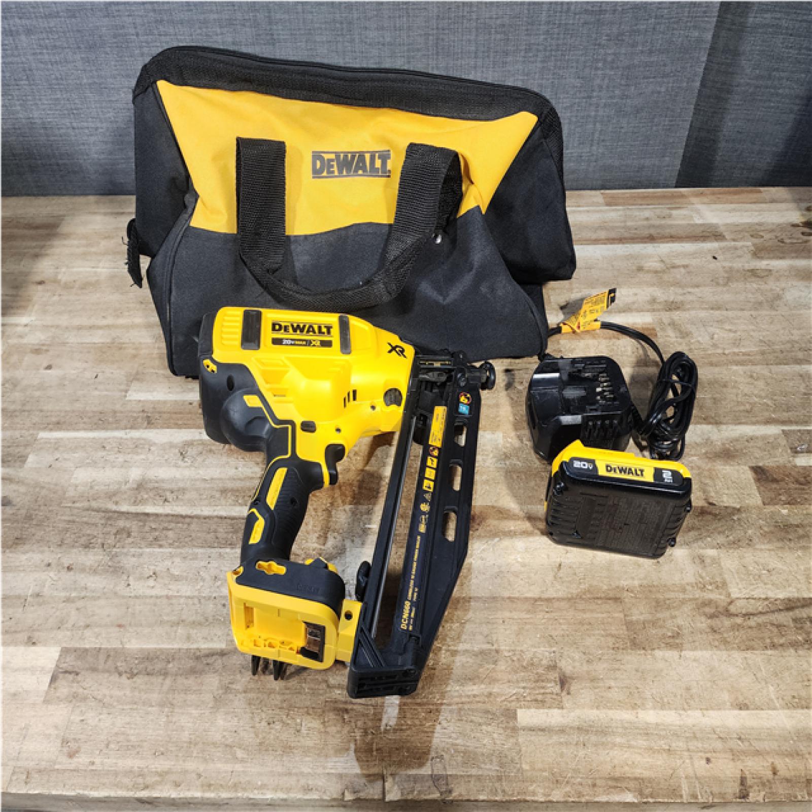 Houston Location AS-IS DeWalt XR Nail Gun and Battery with Charger