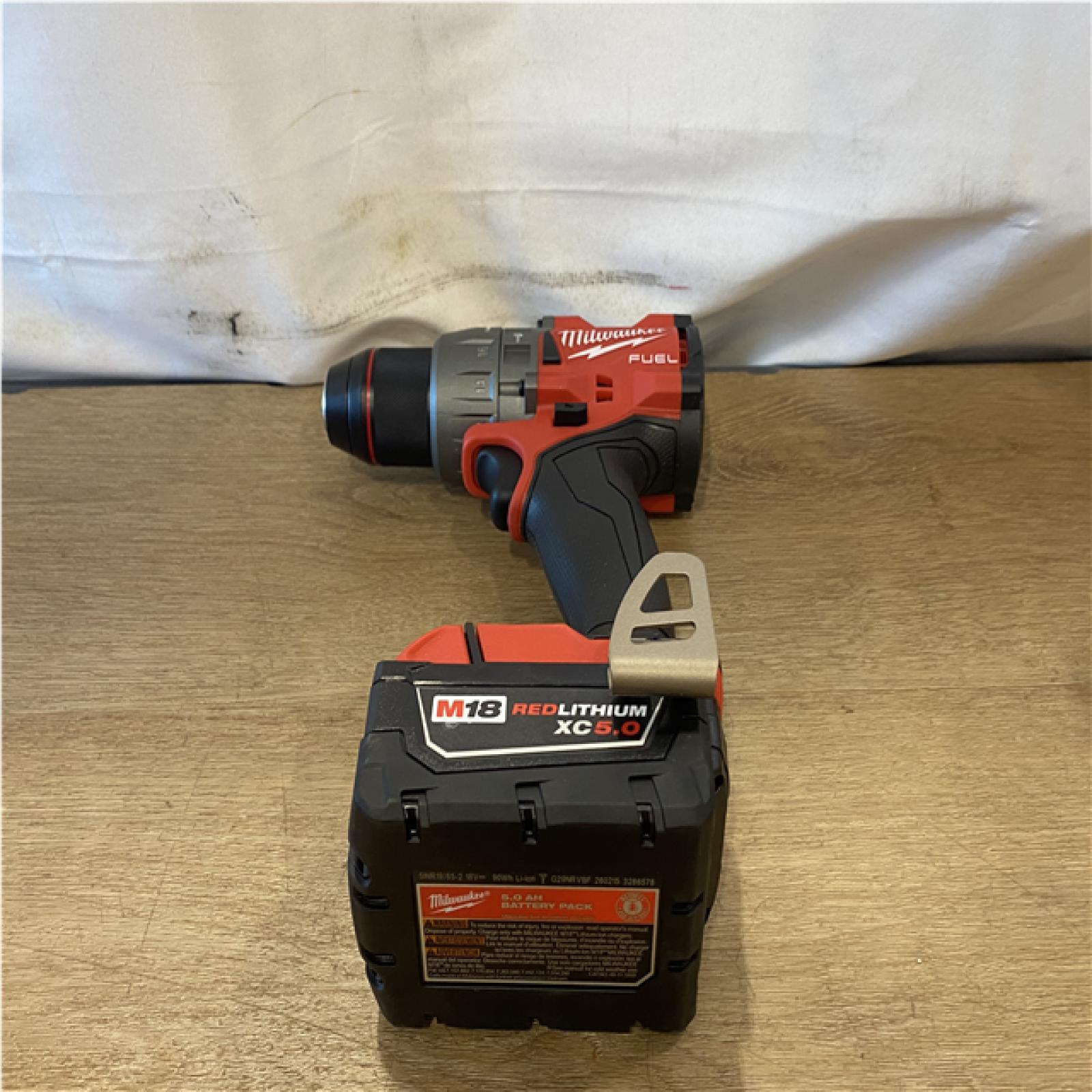 AS-IS Milwaukee FUEL 18V Lithium-Ion Brushless Cordless Hammer Drill and Impact Driver Combo Kit