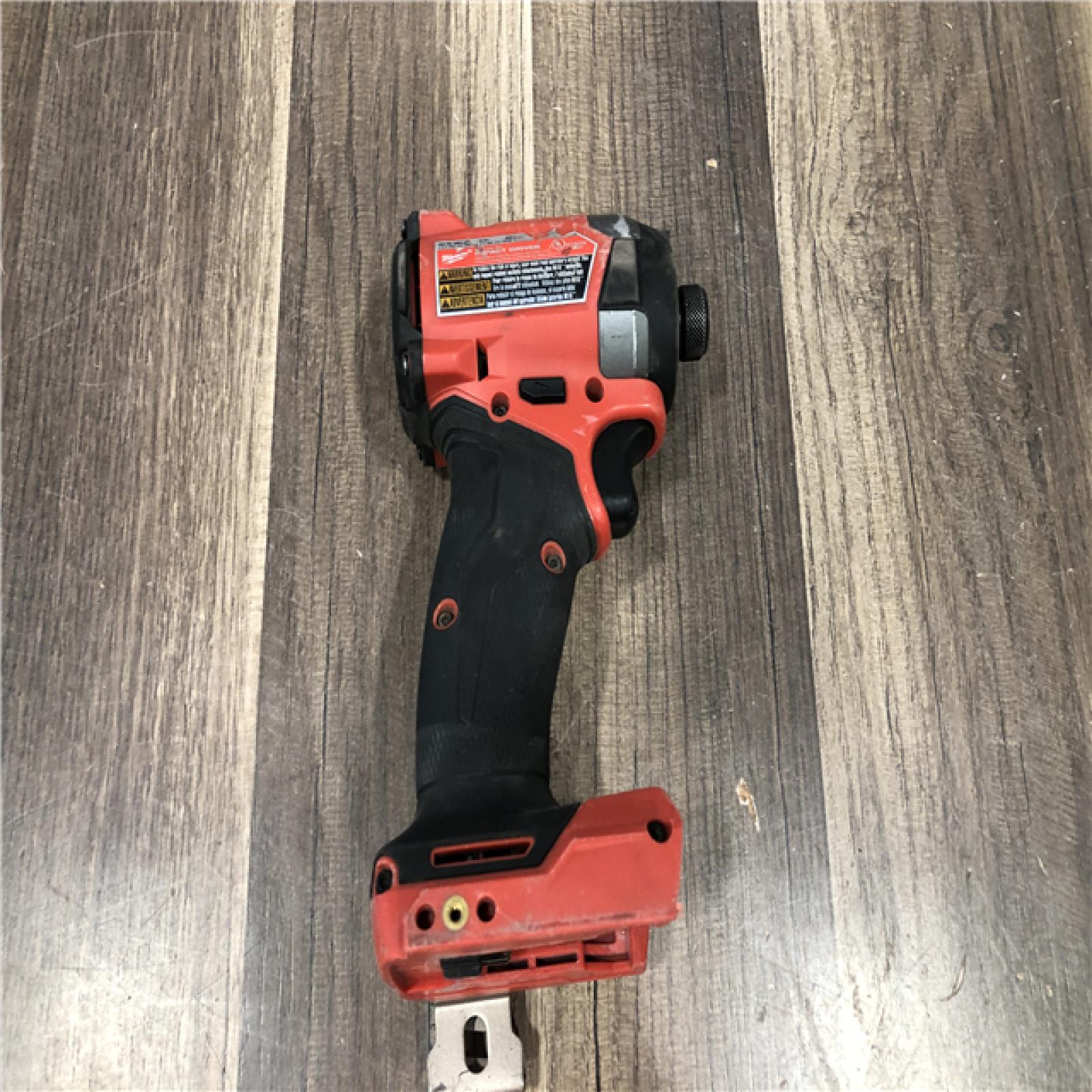 AS-IS Milwaukee FUEL 18V Lithium-Ion Brushless Cordless 1/4 in. Hex Impact Driver (Tool-Only)