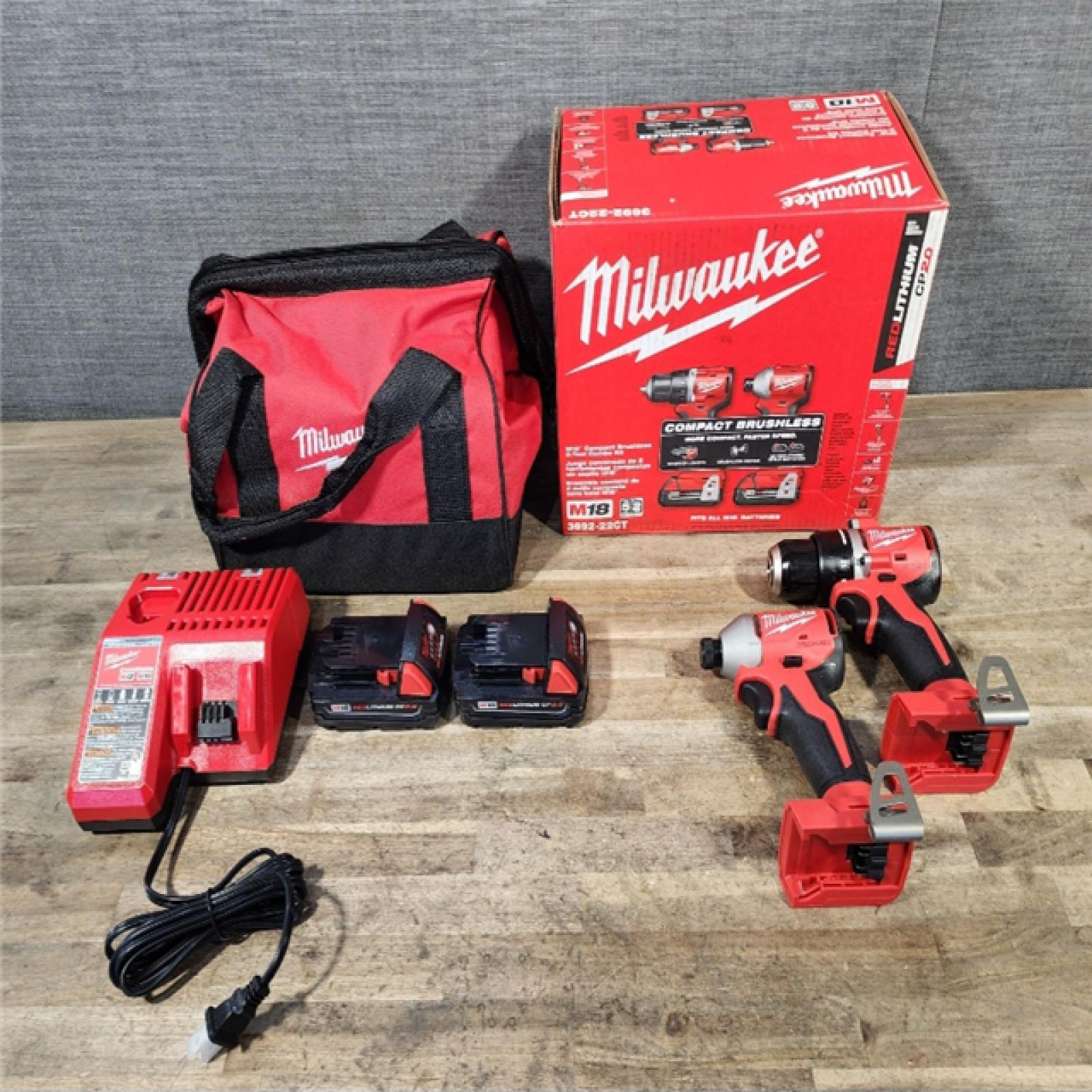 HOUSTON LOCATION - AS-IS Milwaukee M18 18V Lithium-Ion Brushless Cordless Compact Drill/Impact Combo Kit (2-Tool) W/(2) 2.0 Ah Batteries  Charger & Bag