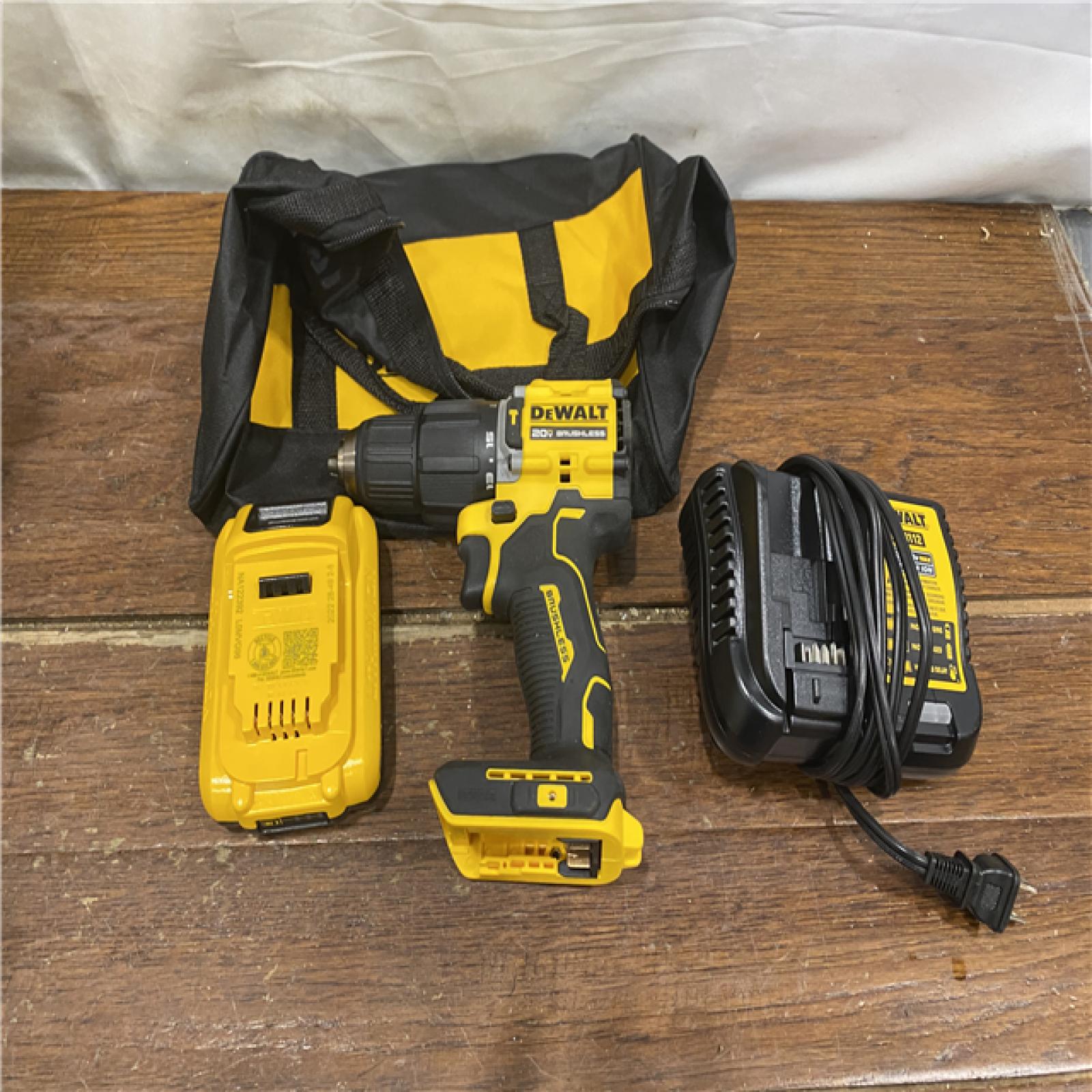 AS-IS DEWALT ATOMIC 20-Volt Lithium-Ion Cordless 1/2 in. Compact Hammer Drill with 3.0Ah Battery, Charger and Bag