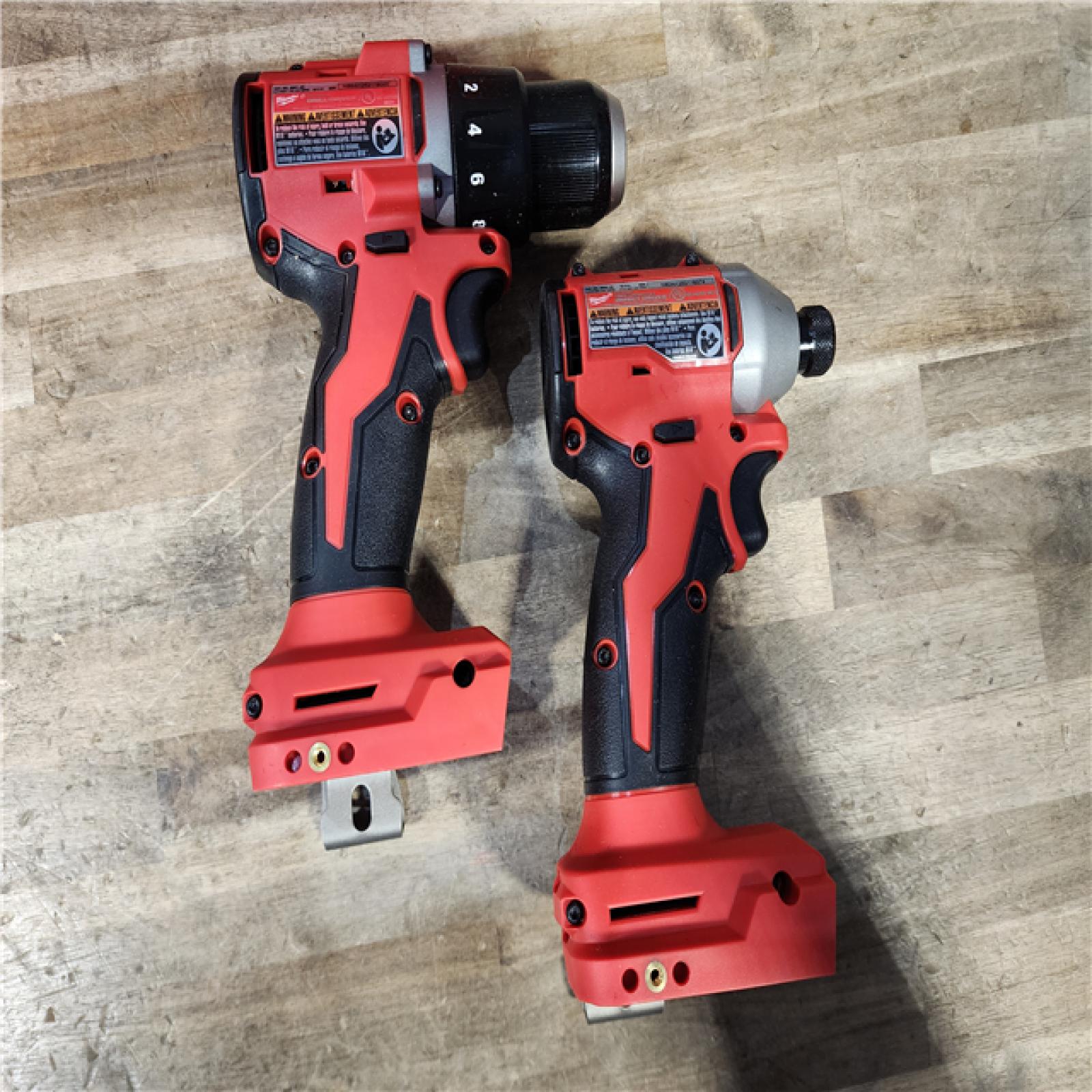 HOUSTON LOCATION - AS-IS Milwaukee M18 18V Lithium-Ion Brushless Cordless Compact Drill/Impact Combo Kit (2-Tool) W/(2) 2.0 Ah Batteries  Charger & Bag