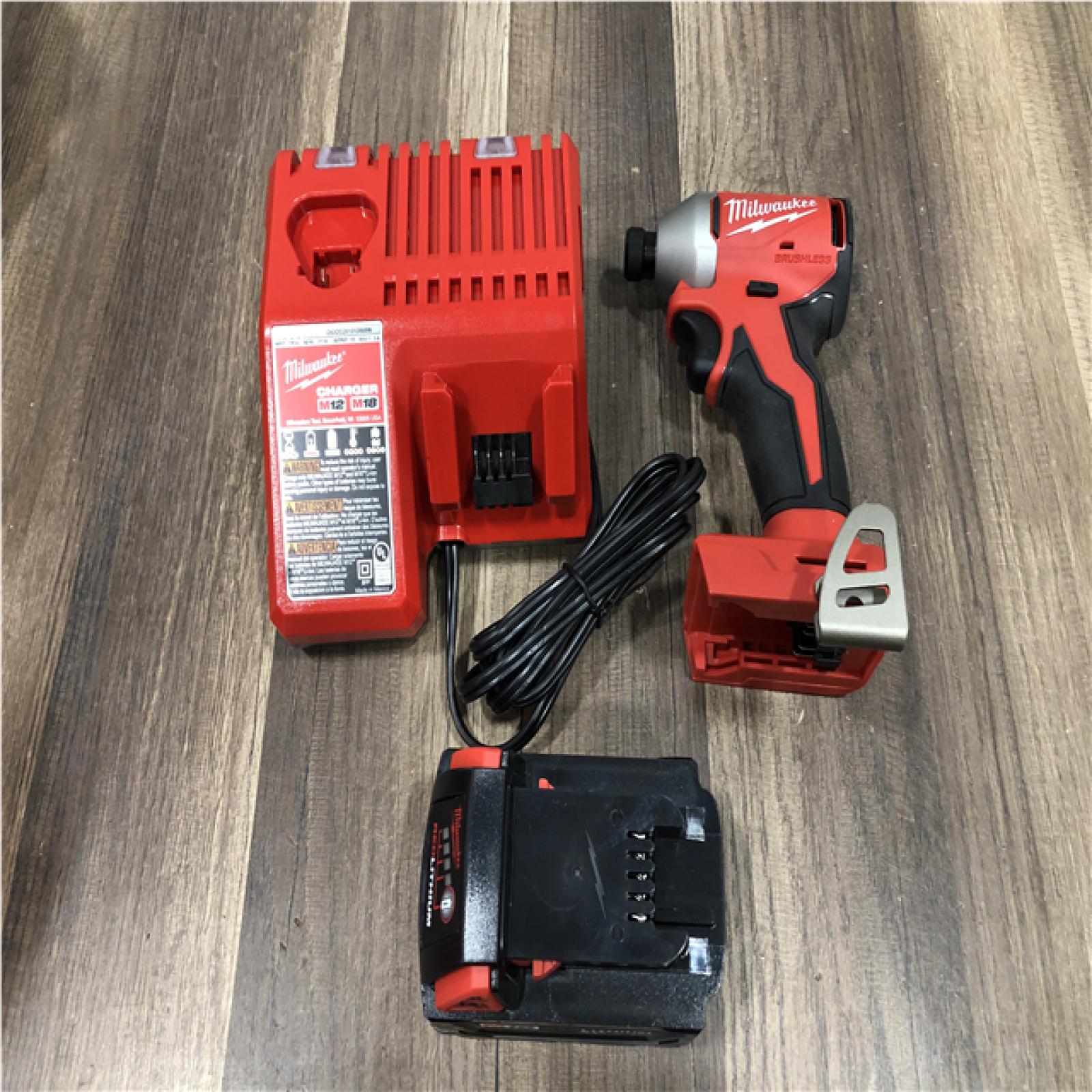 AS-IS Milwaukee 18V Lithium-Ion Compact Brushless Cordless 1/4 in. Impact Driver Kit