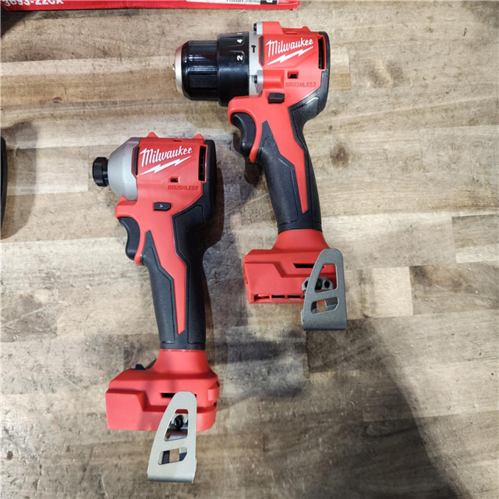 HOUSTON LOCATION - AS-IS M18 18-Volt Lithium-Ion Brushless Cordless Compact Hammer Drill/Impact Combo Kit (2-Tool) with (2) Batteries  Bag