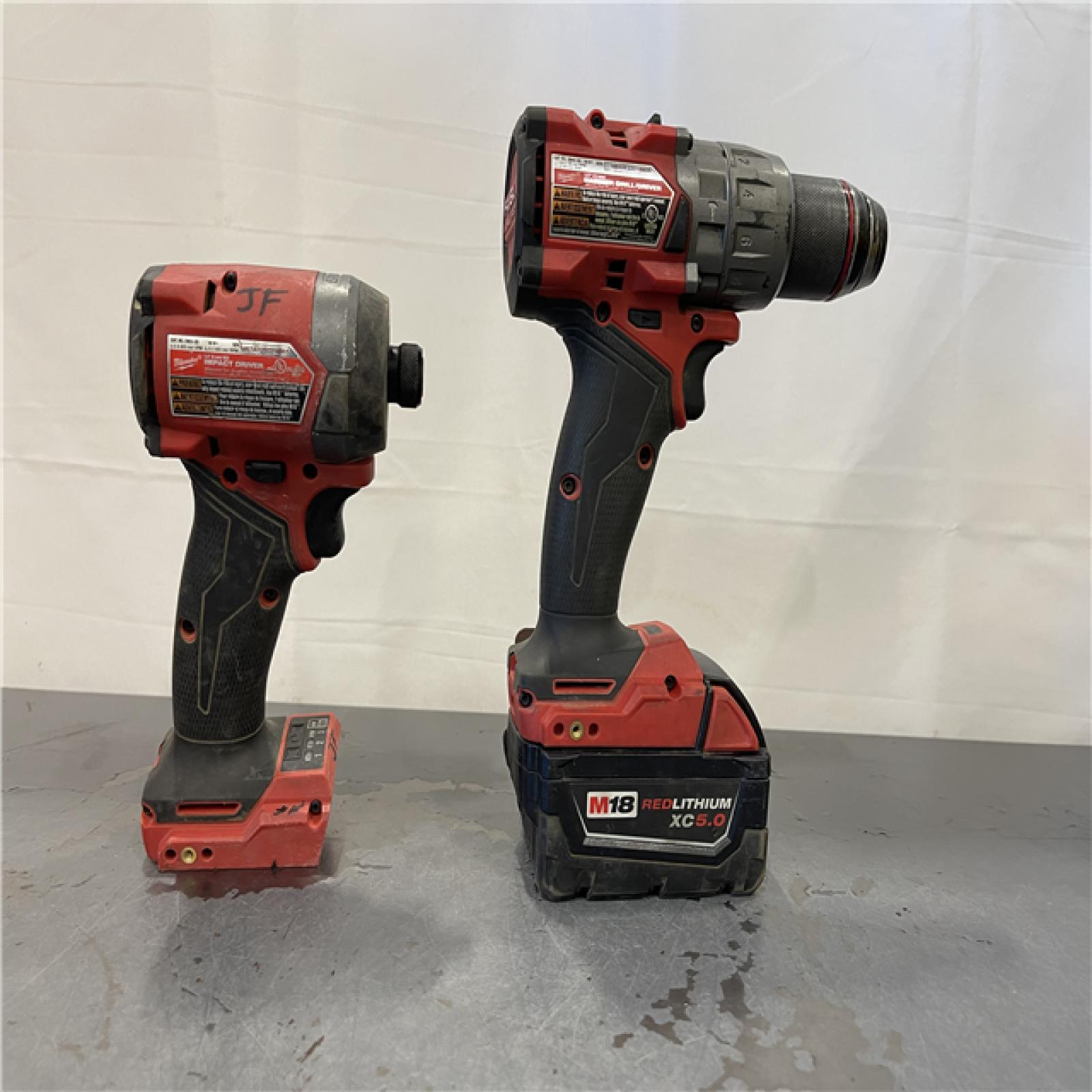 AS-IS - MILWAUKEE FUEL 18V Lithium-Ion Brushless Cordless Hammer Drill and Impact Driver Combo Kit