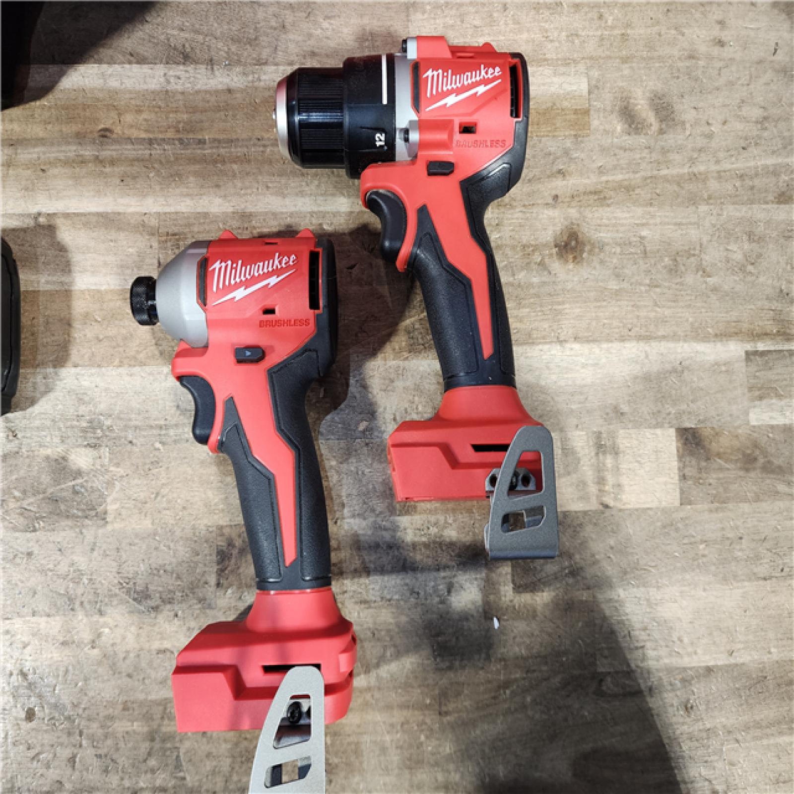 HOUSTON LOCATION - AS-IS Milwaukee M18 18V Lithium-Ion Brushless Cordless Compact Drill/Impact Combo Kit (2-Tool) W/(2) 2.0 Ah Batteries  Charger & Bag