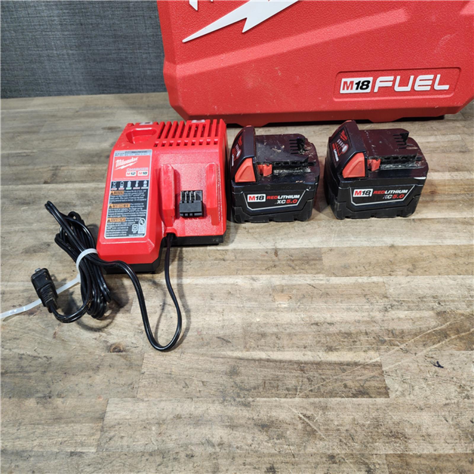HOUSTON LOCATION - AS-IS Milwaukee FUEL 18V Lithium-Ion Brushless Cordless Hammer Drill and Impact Driver Combo Kit