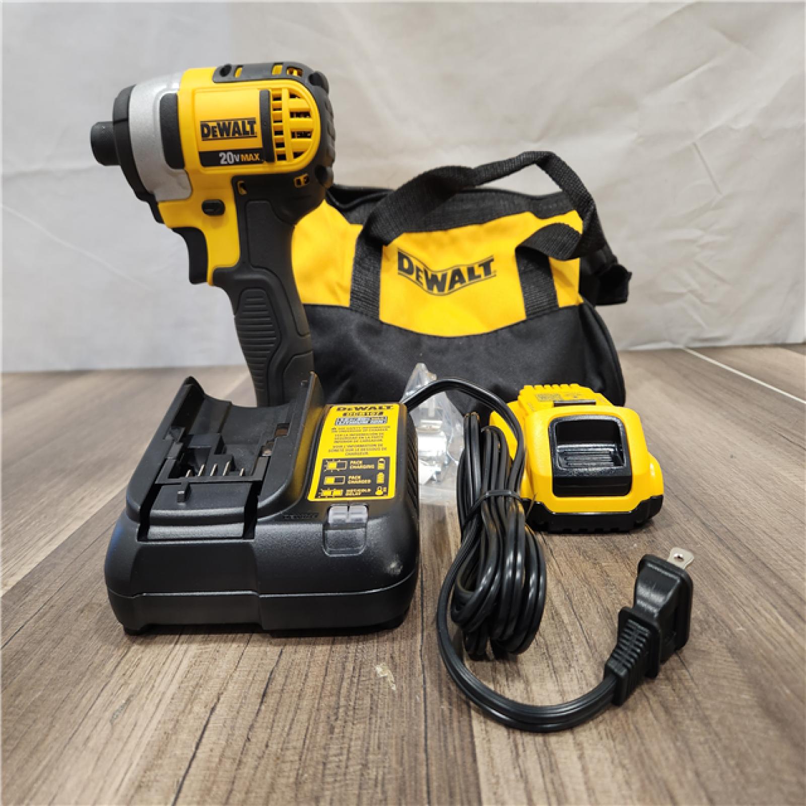 AS-IS- DeWALT ATOMIC 20V MAX Cordless Compact Impact Driver Kit W/ Li-Ion 2ah Battery  1/4  Brushless