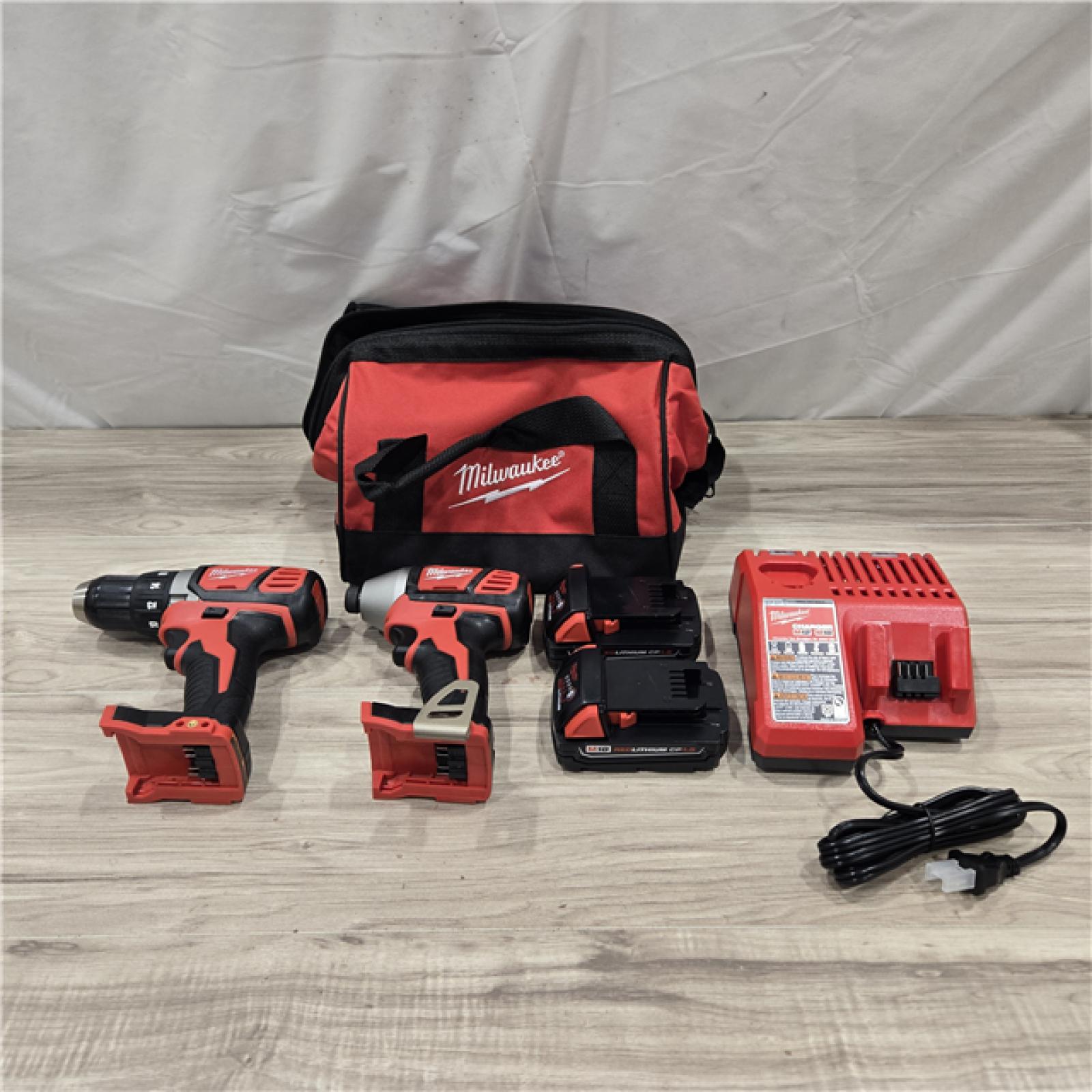 AS-IS Milwaukee 18V Cordless 2-Tool Drill/Driver and Impact Driver Kit