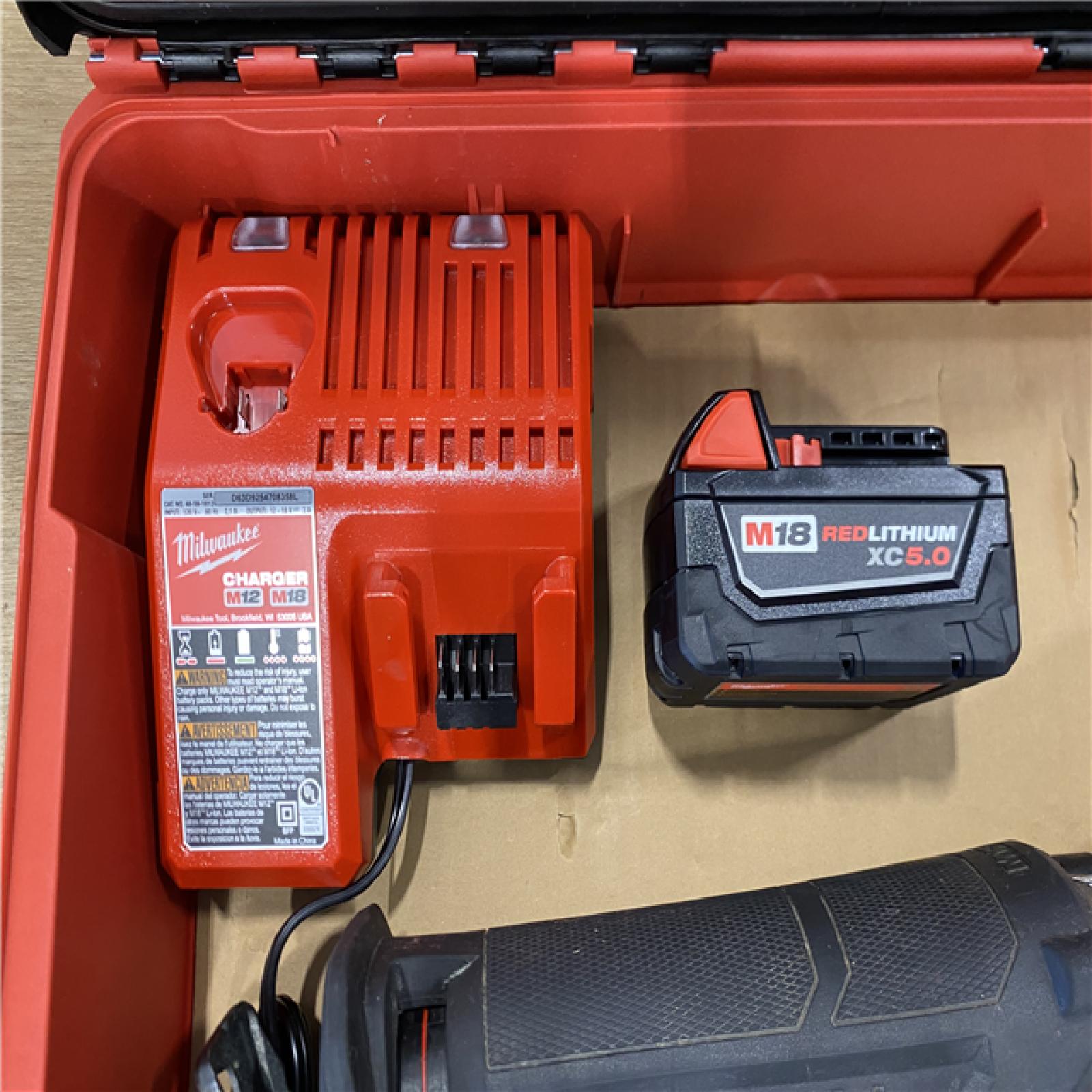 AS-IS MILWAUKEE M18 FUEL18V Lithium-Ion Brushless Cordless SAWZALL Reciprocating Saw with PACKOUT Tool-Box  (1) 5.0 Battery  and Charger