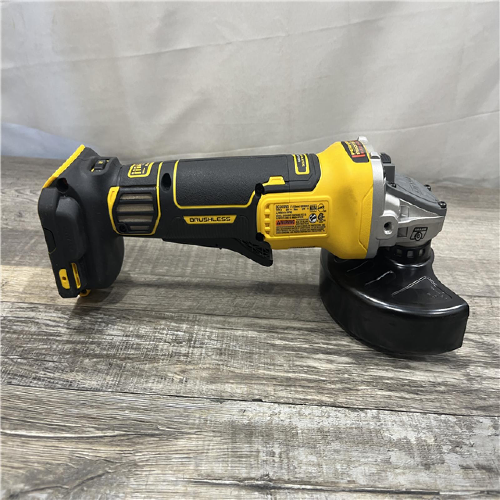 AS-IS DEWALT 20V XR Cordless 4-1/2. in. to 5 in. Variable Speed Angle Grinder (Tool Only)