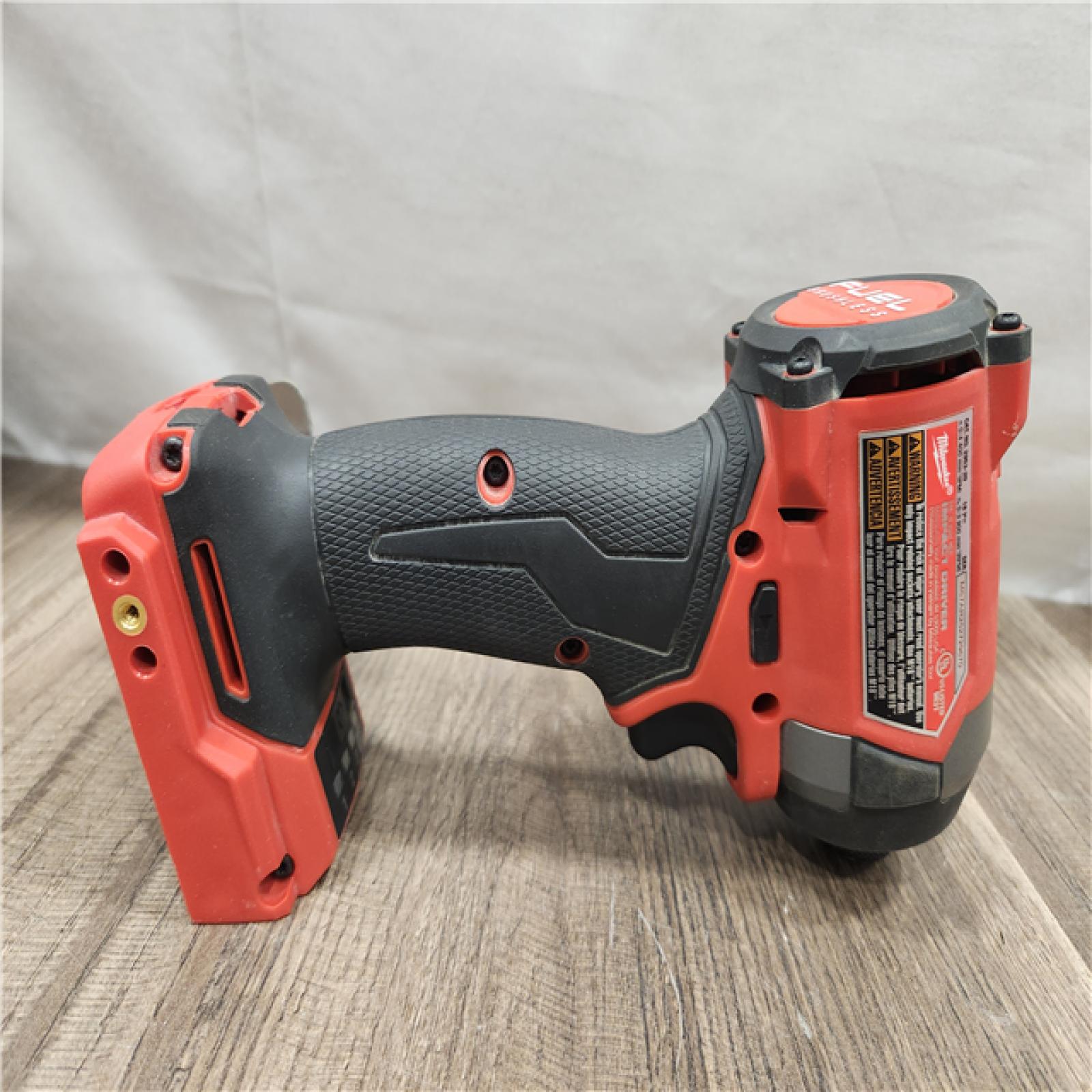 AS-IS- Milwaukee 18V Lithium-Ion Brushless Cordless 1/4 Hex Impact Driver (Tool-Only)