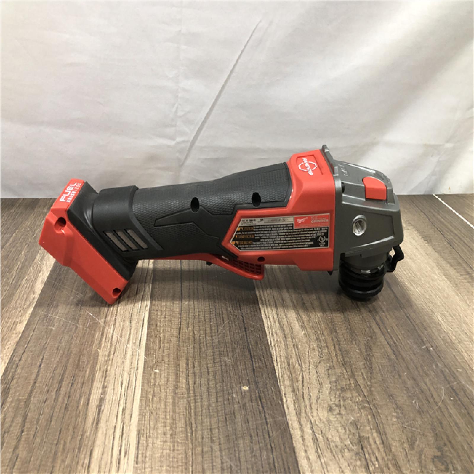 AS-IS Milwaukee FUEL 18V Lithium-Ion Brushless Cordless 4-1/2 in./5 in. Grinder w/Paddle Switch (Tool-Only)